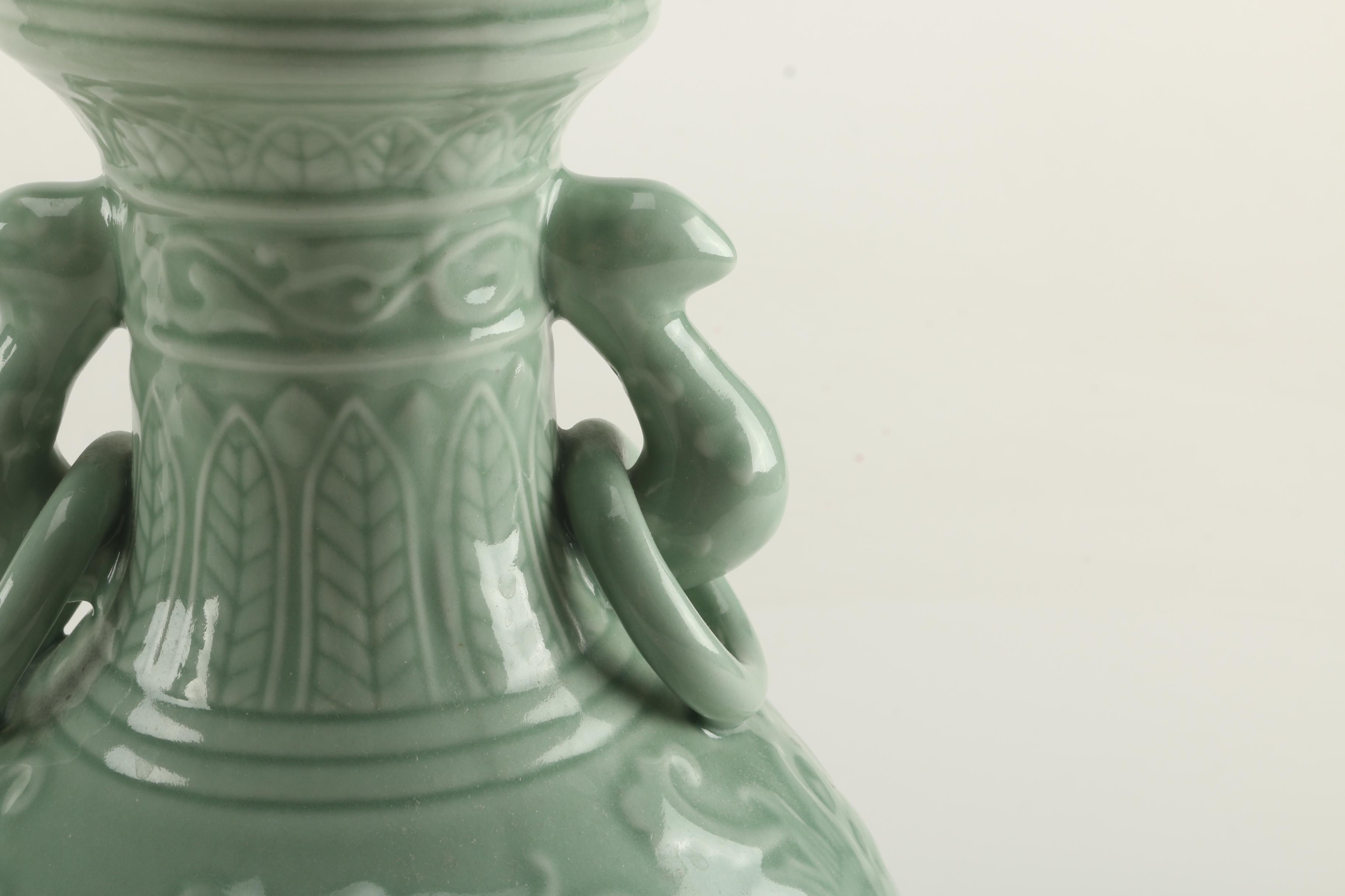 Two Celadon Green Ceramic Urns