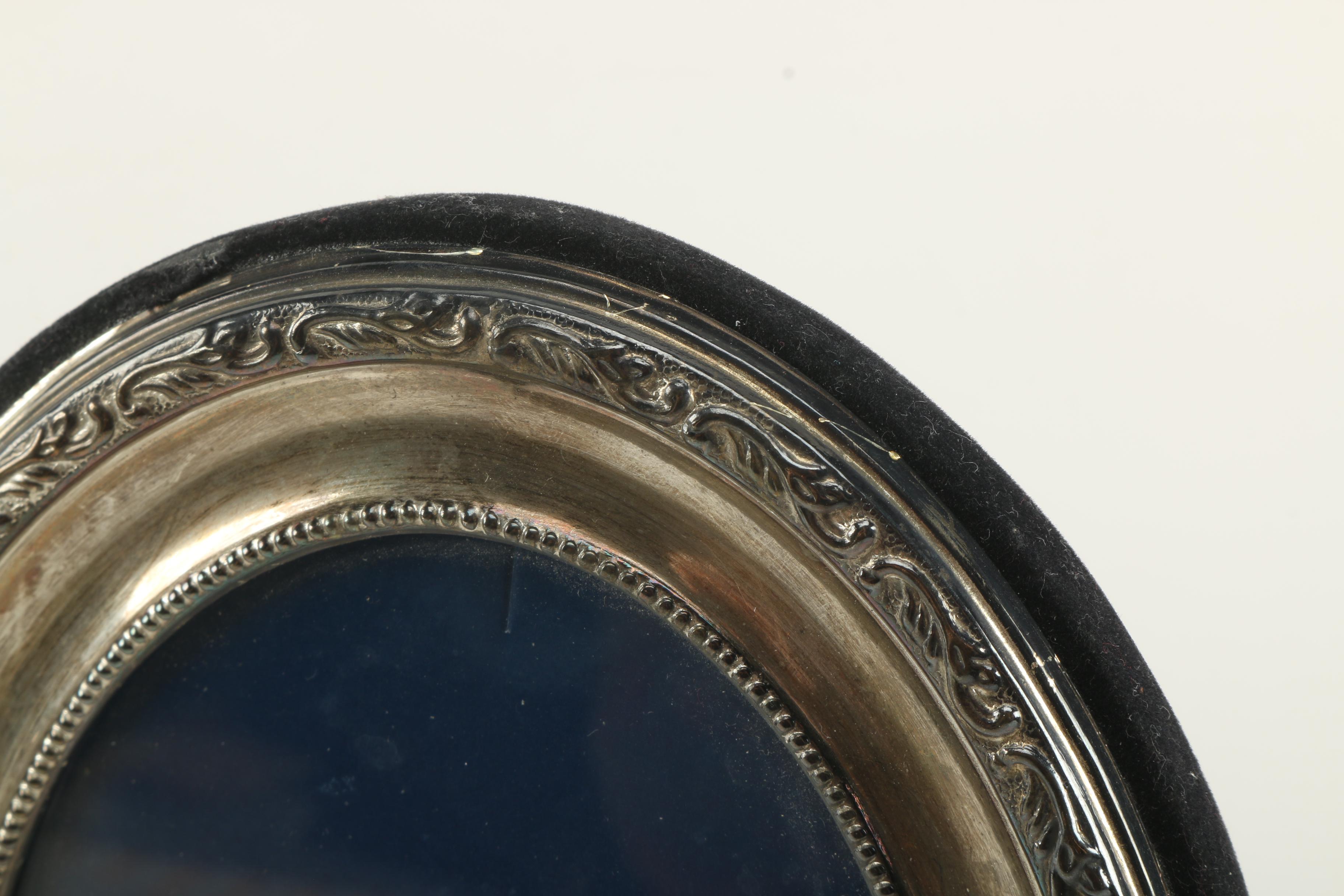 John Bull Ltd. Sterling Picture Frame and a Silver Plate Frame