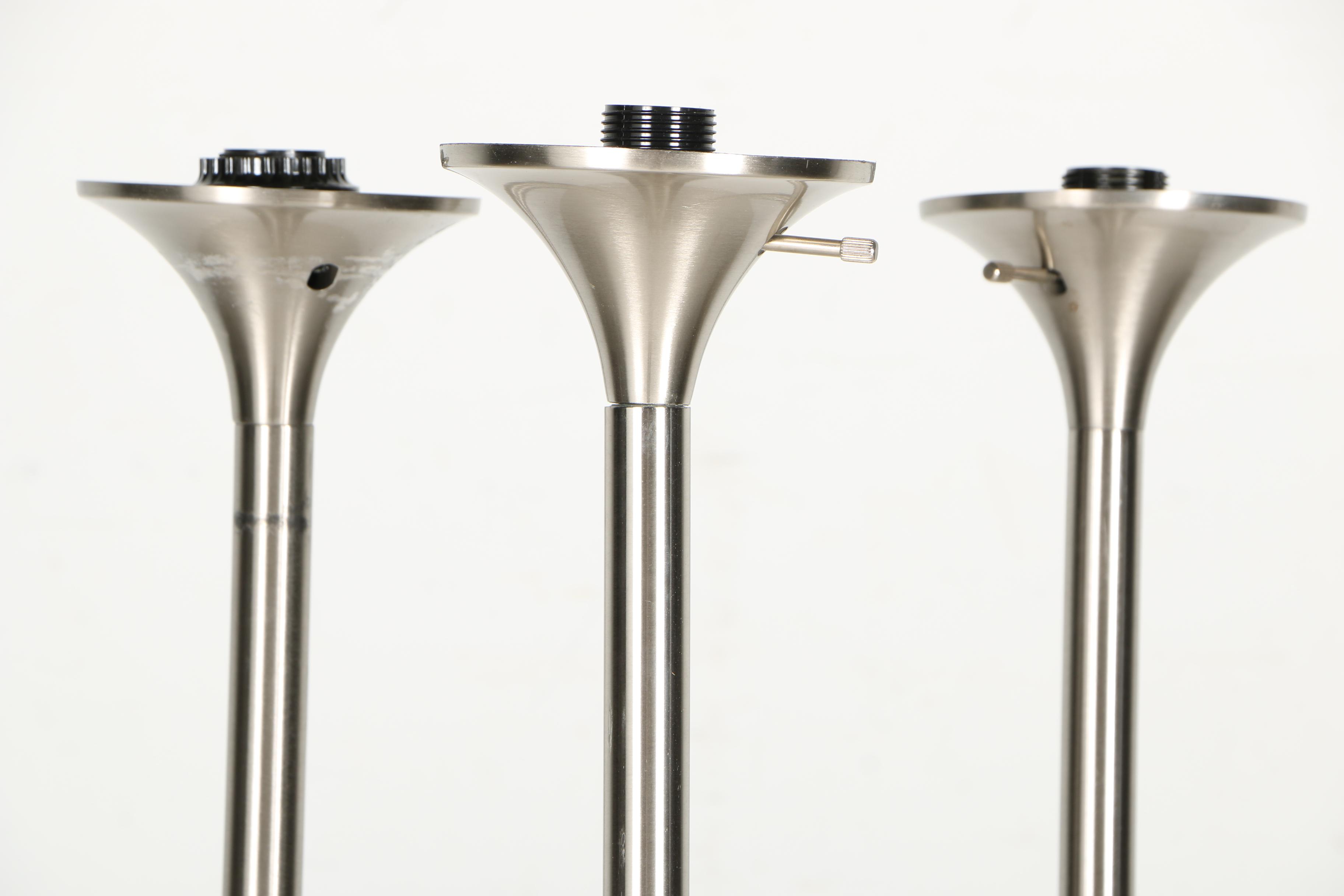 Three Stainless Steel Floor Torchiere Lamps