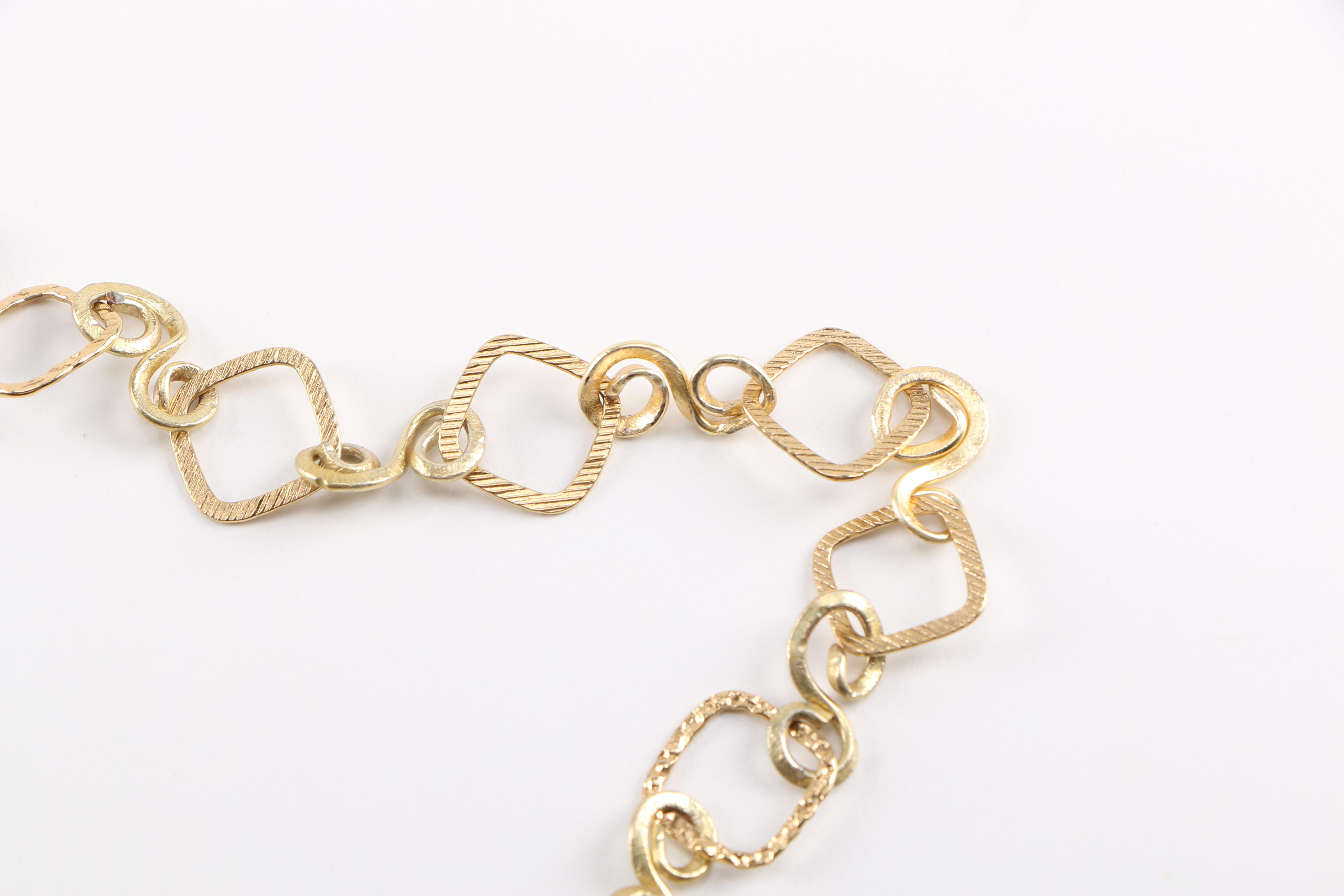 Assorted Gold Tone Accent Jewelry