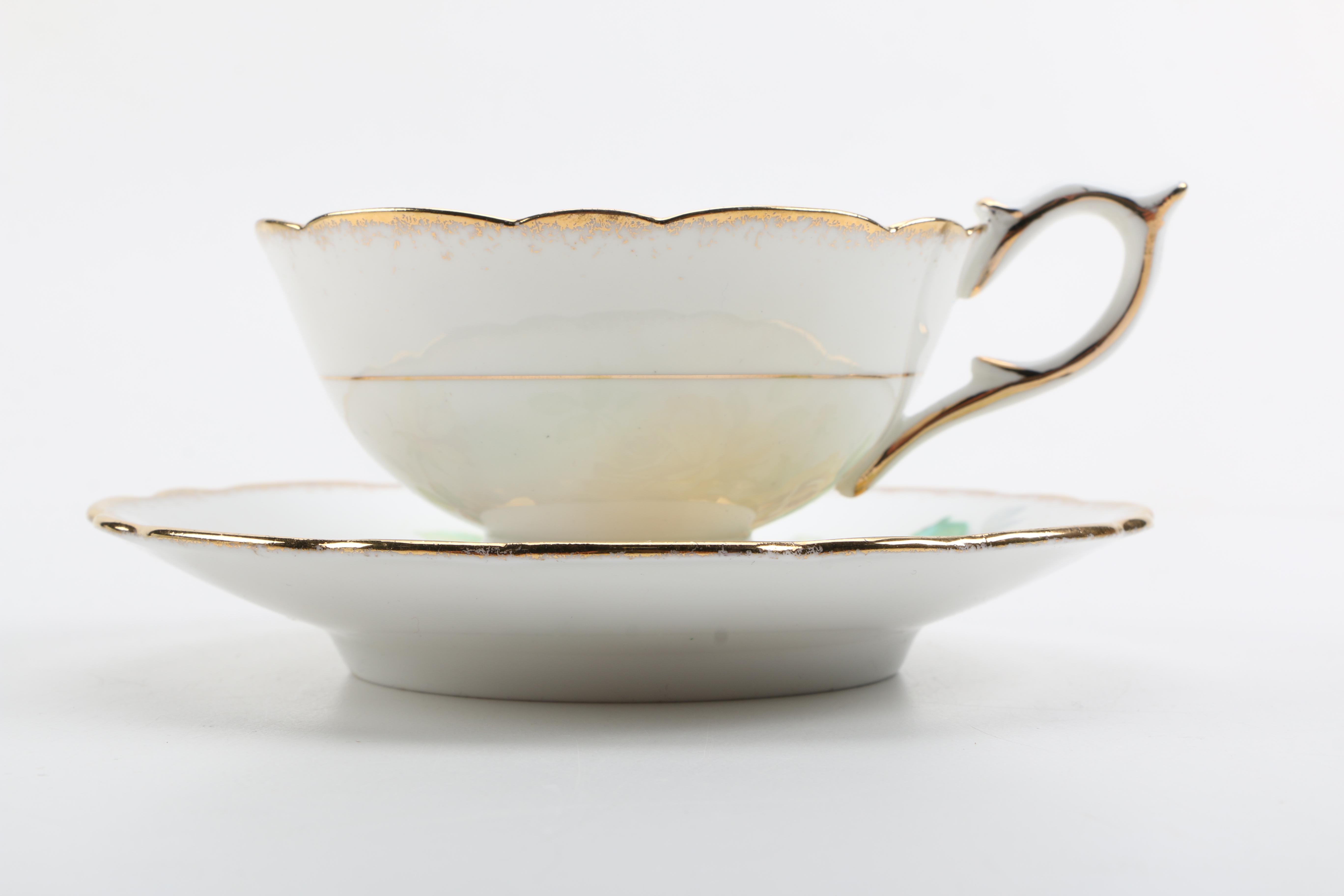 Porcelain Teacups with Saucers Featuring Meissen "Green Ivy Leaf"