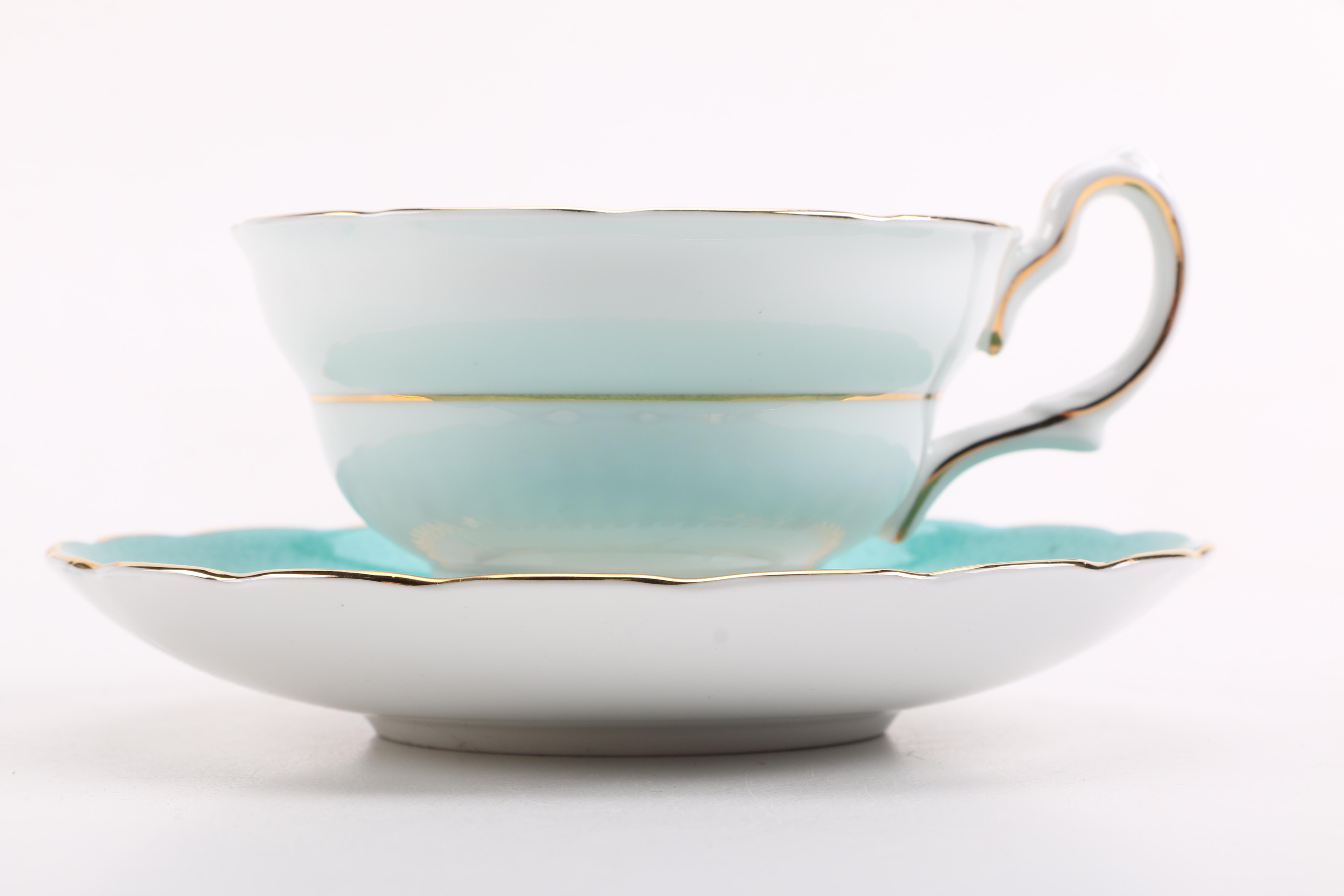 Porcelain Teacups with Saucers Featuring Meissen "Green Ivy Leaf"