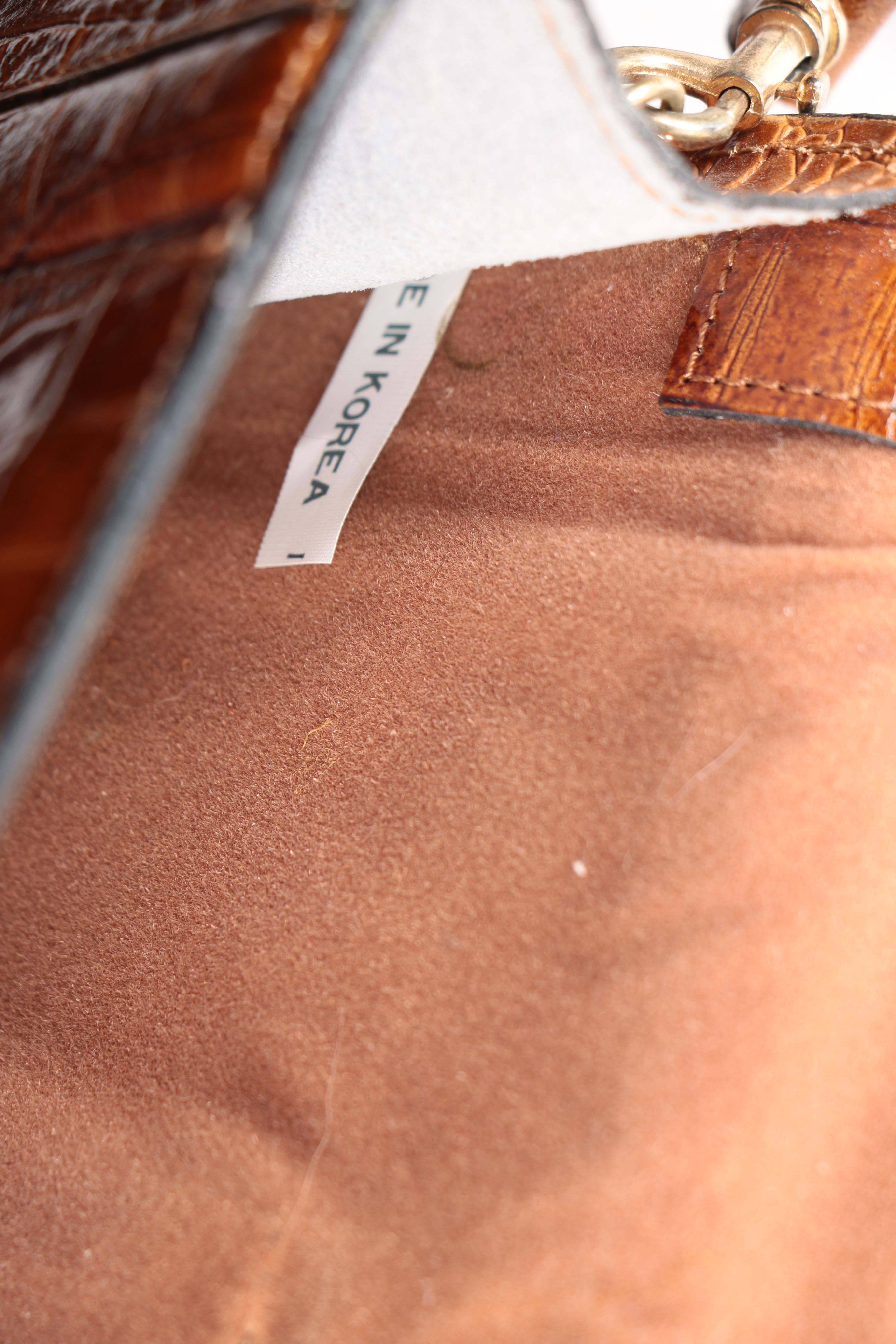 Embossed Leather Briefcase and Alligator Clutch