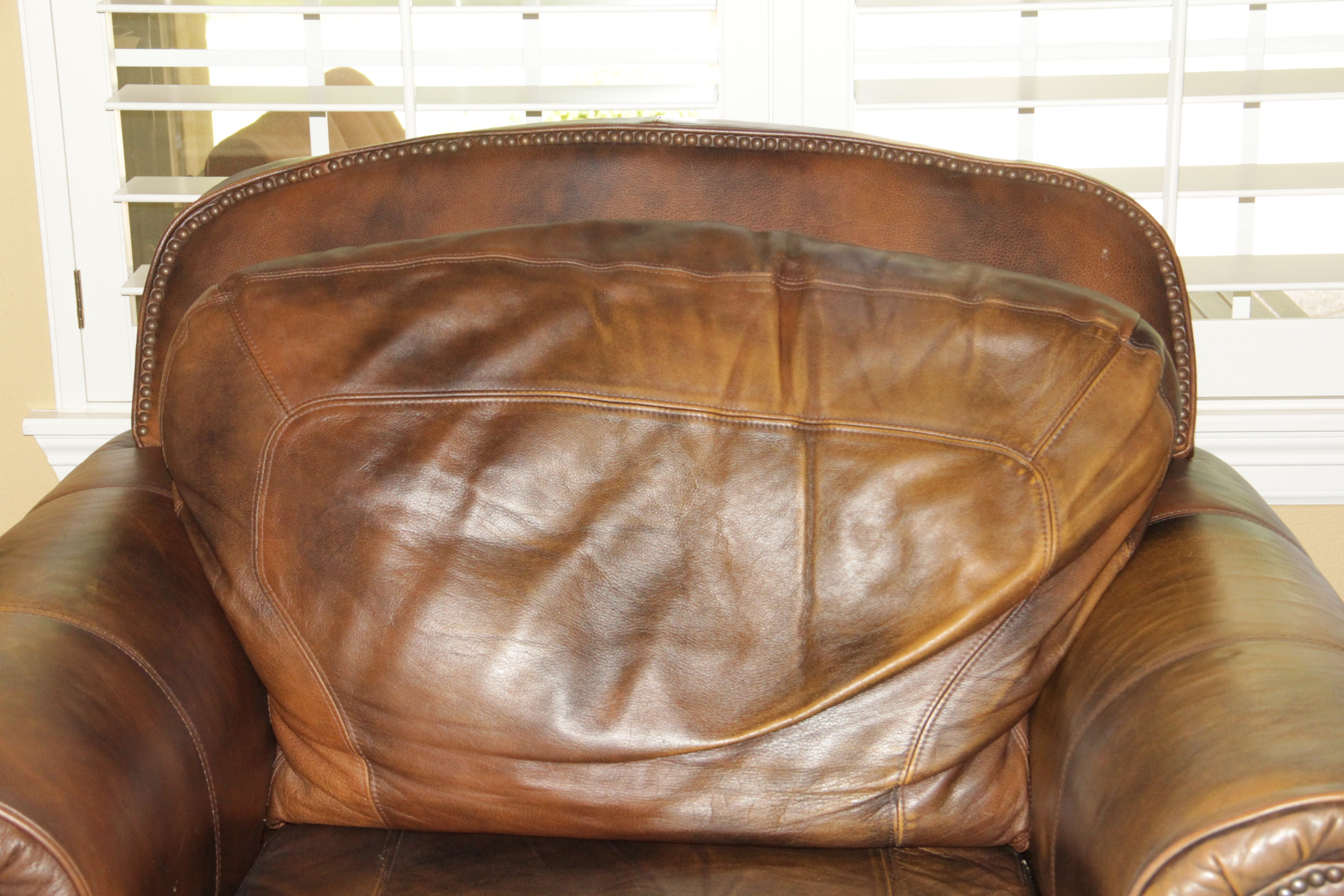Leather Arm Chair and Ottoman by Lane
