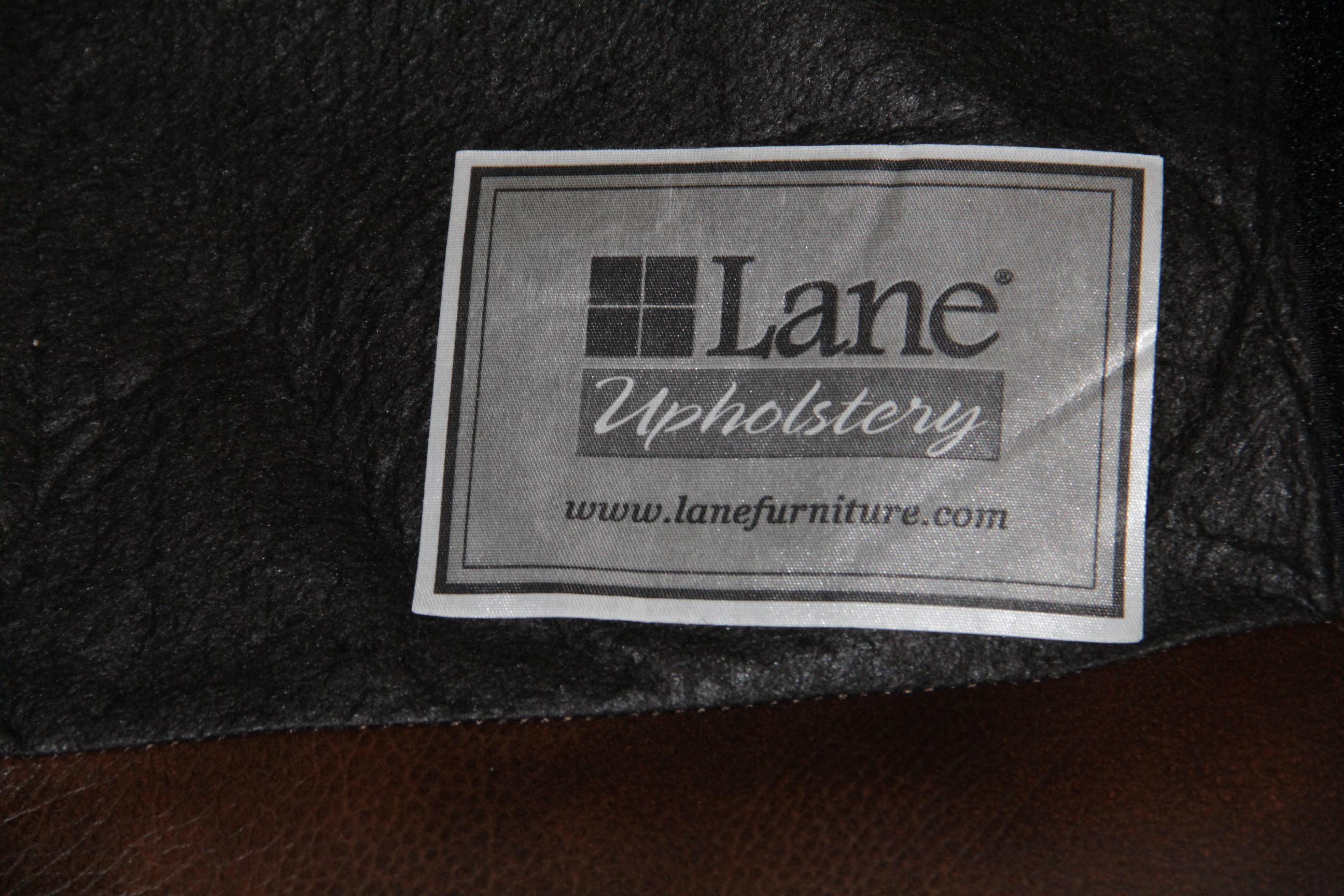 Leather Arm Chair and Ottoman by Lane