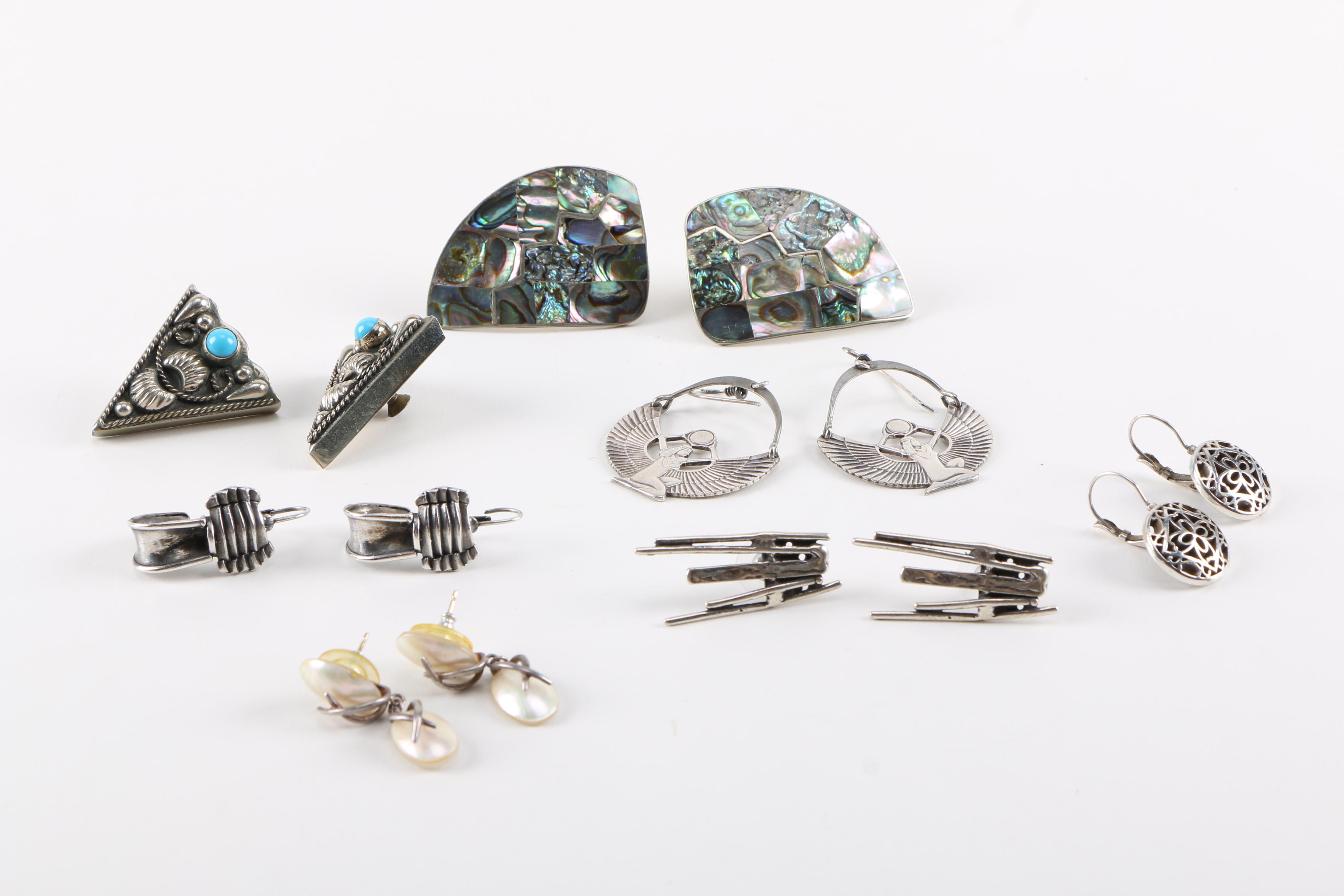 Assortment of Silver Tone Jewelry Including Abalone and Mother of Pearl Stones