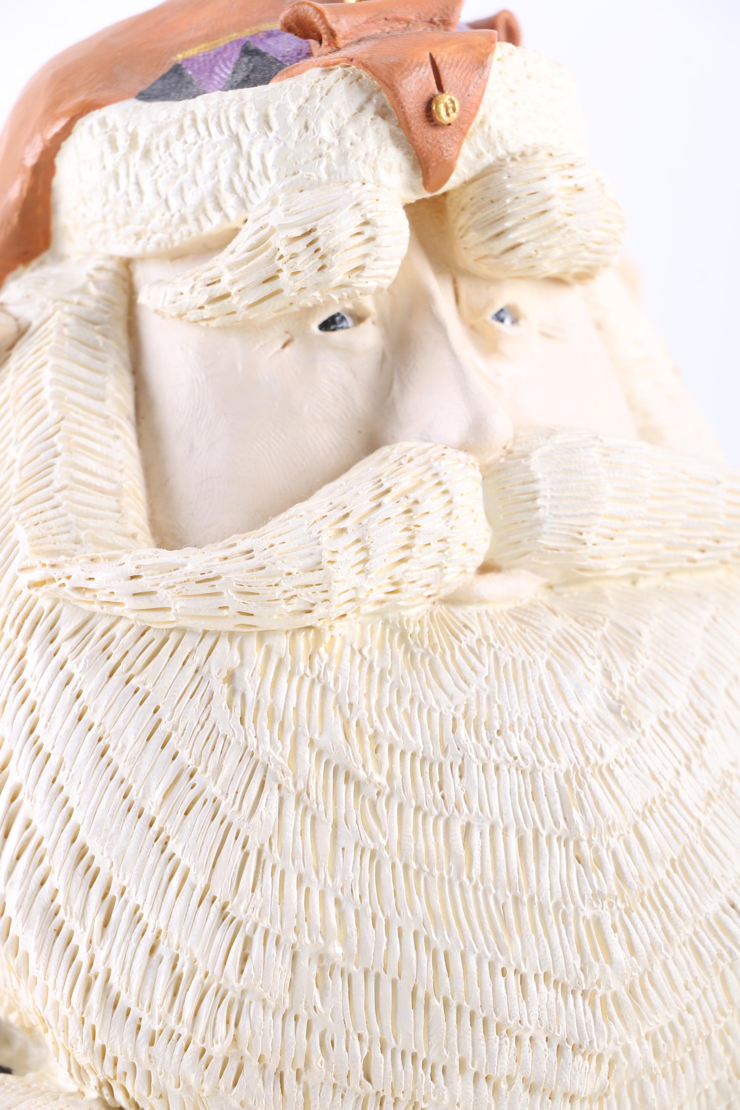 Collection of "Just Believe" Santa Figurines