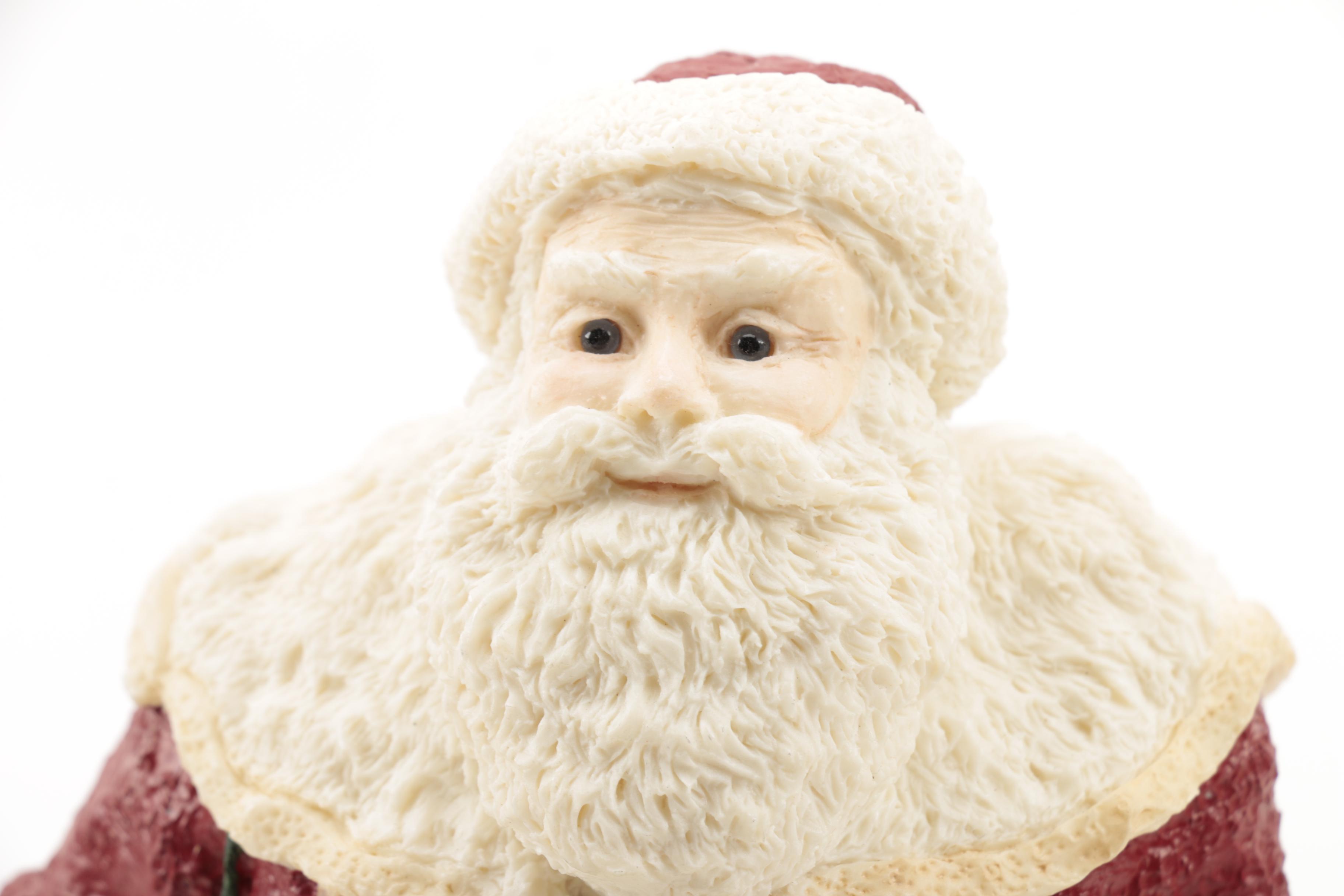 Three Santa Claus Ceramic Figurines