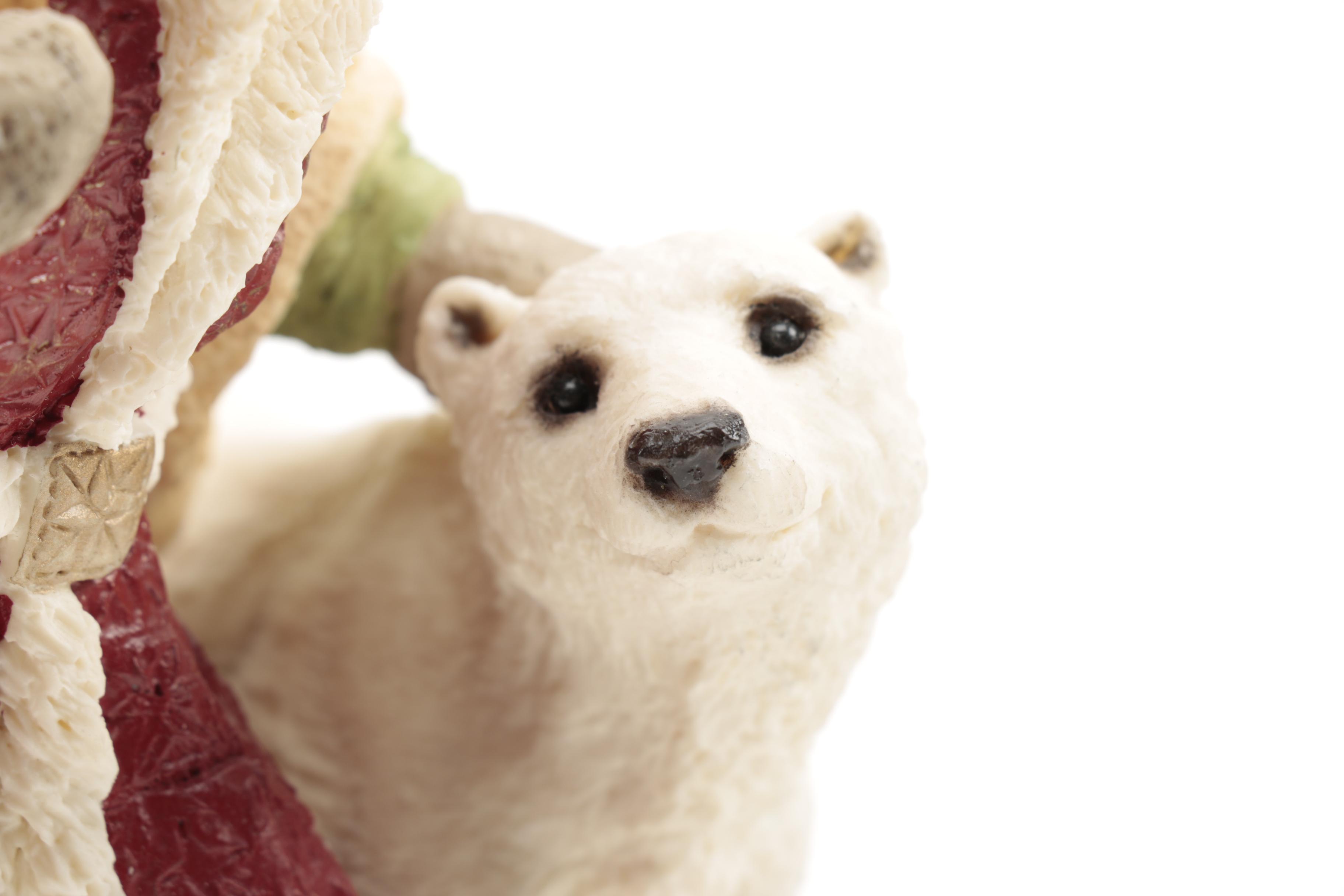 Three Santa Claus Ceramic Figurines