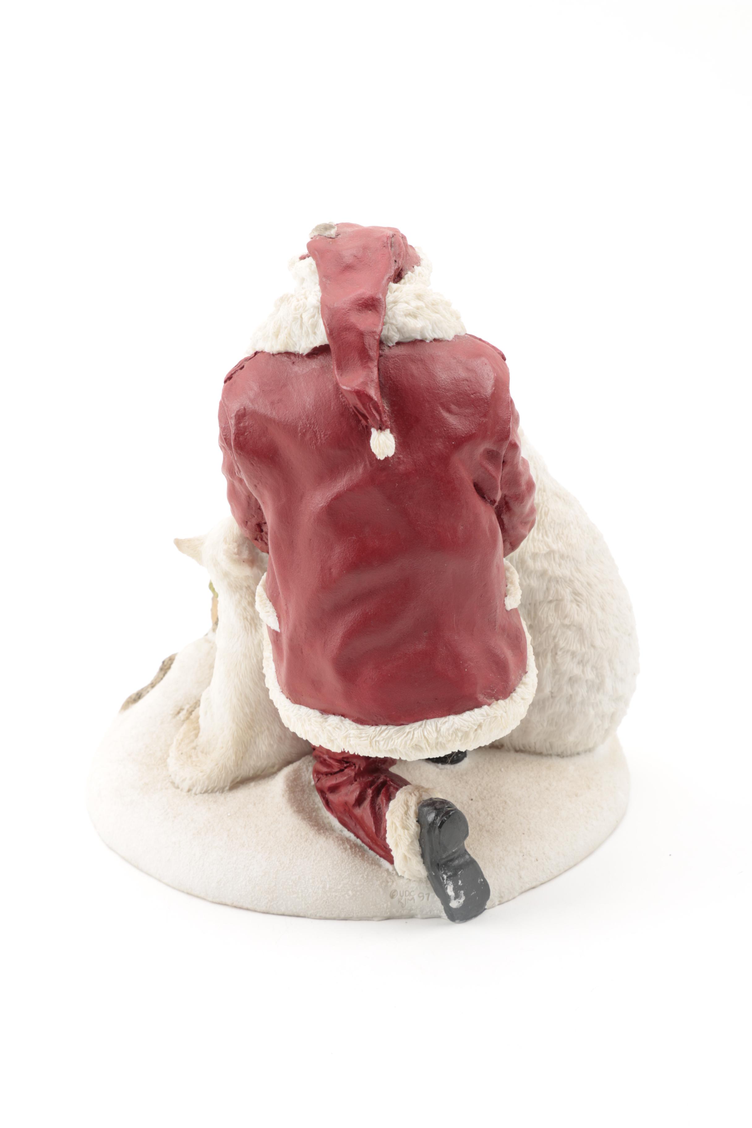 Three Santa Claus Ceramic Figurines