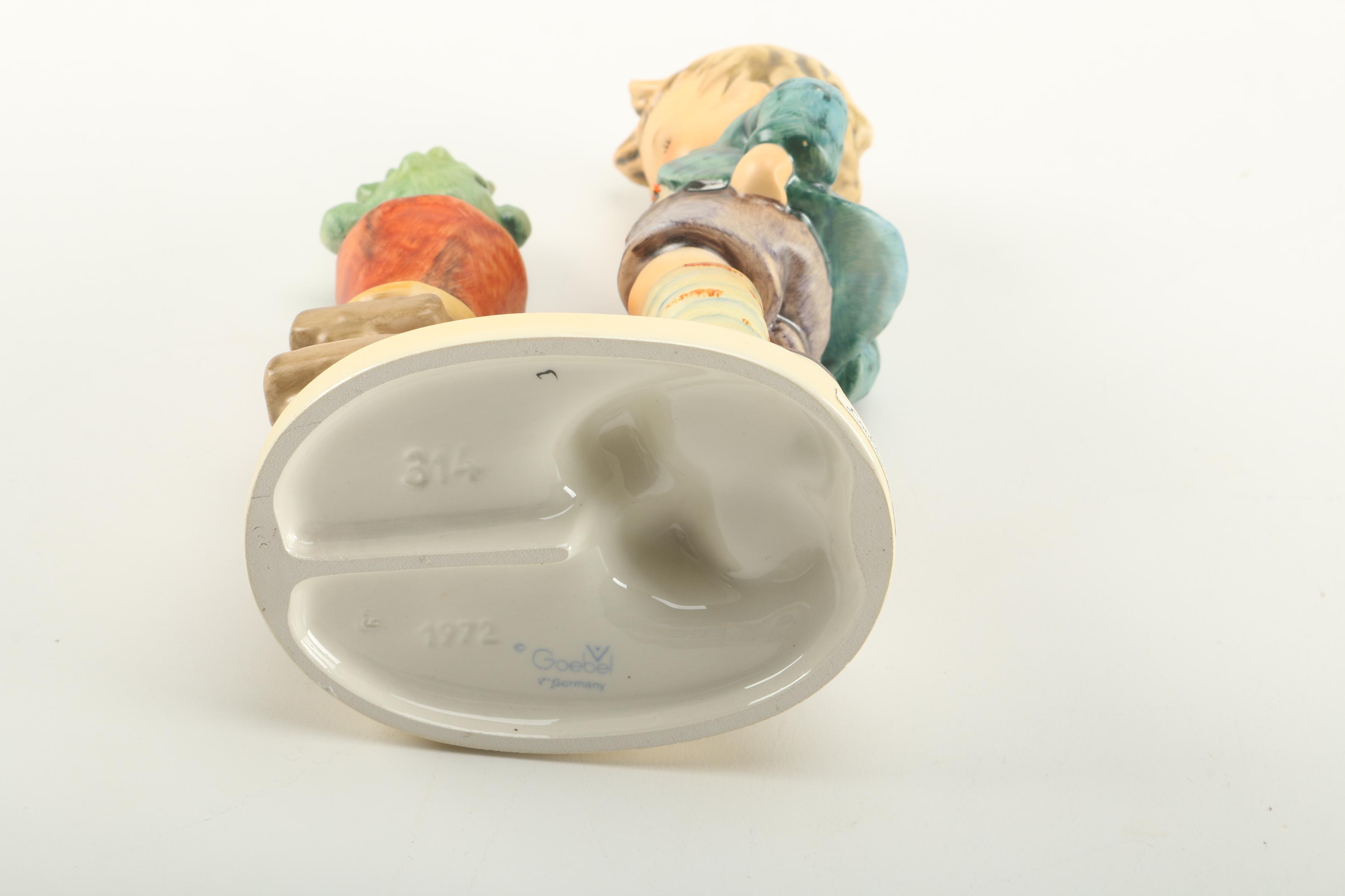 Goebel Hummel Figurines Featuring "Street Singer"