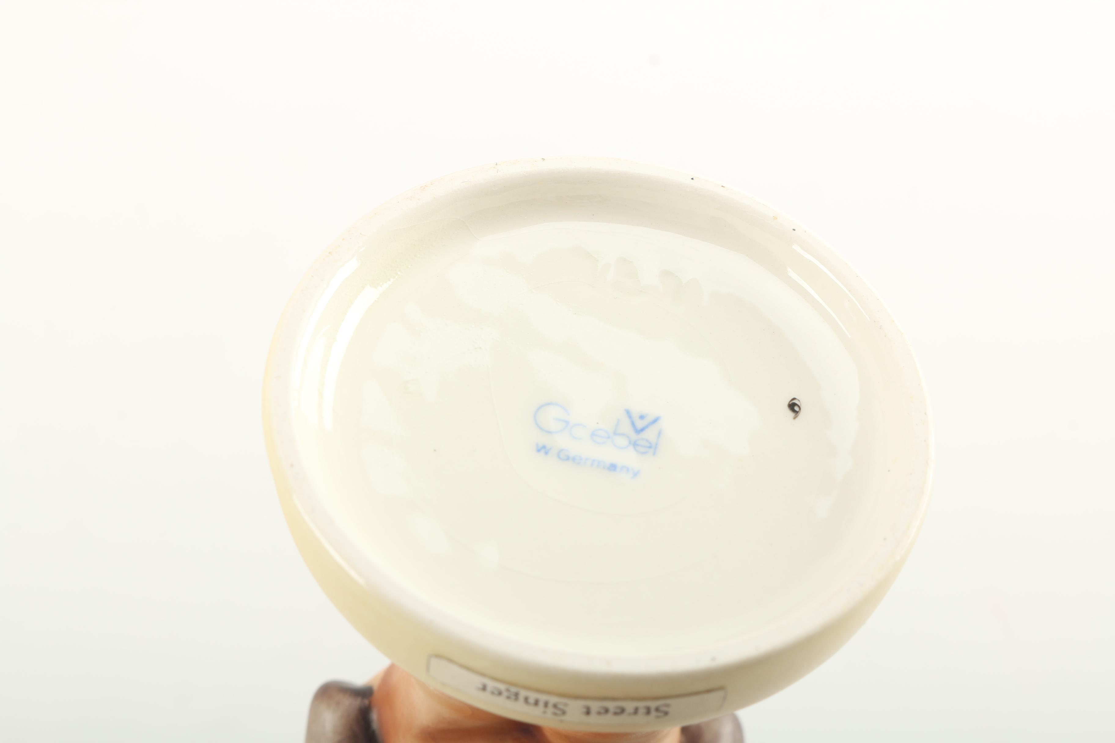 Goebel Hummel Figurines Featuring "Street Singer"