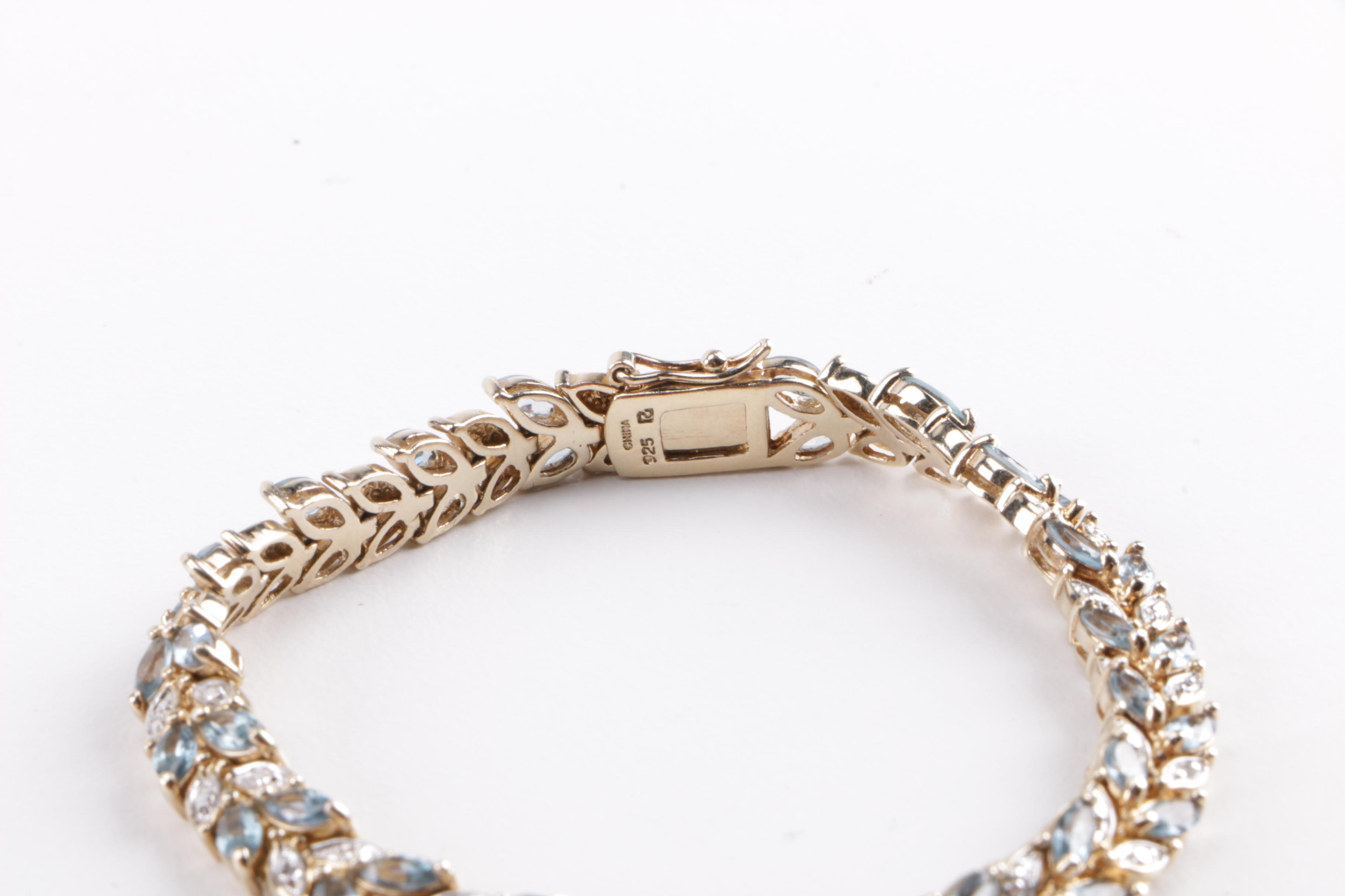 Sterling Silver and Diamond Jewelry Including Blue Topaz Demi Parure