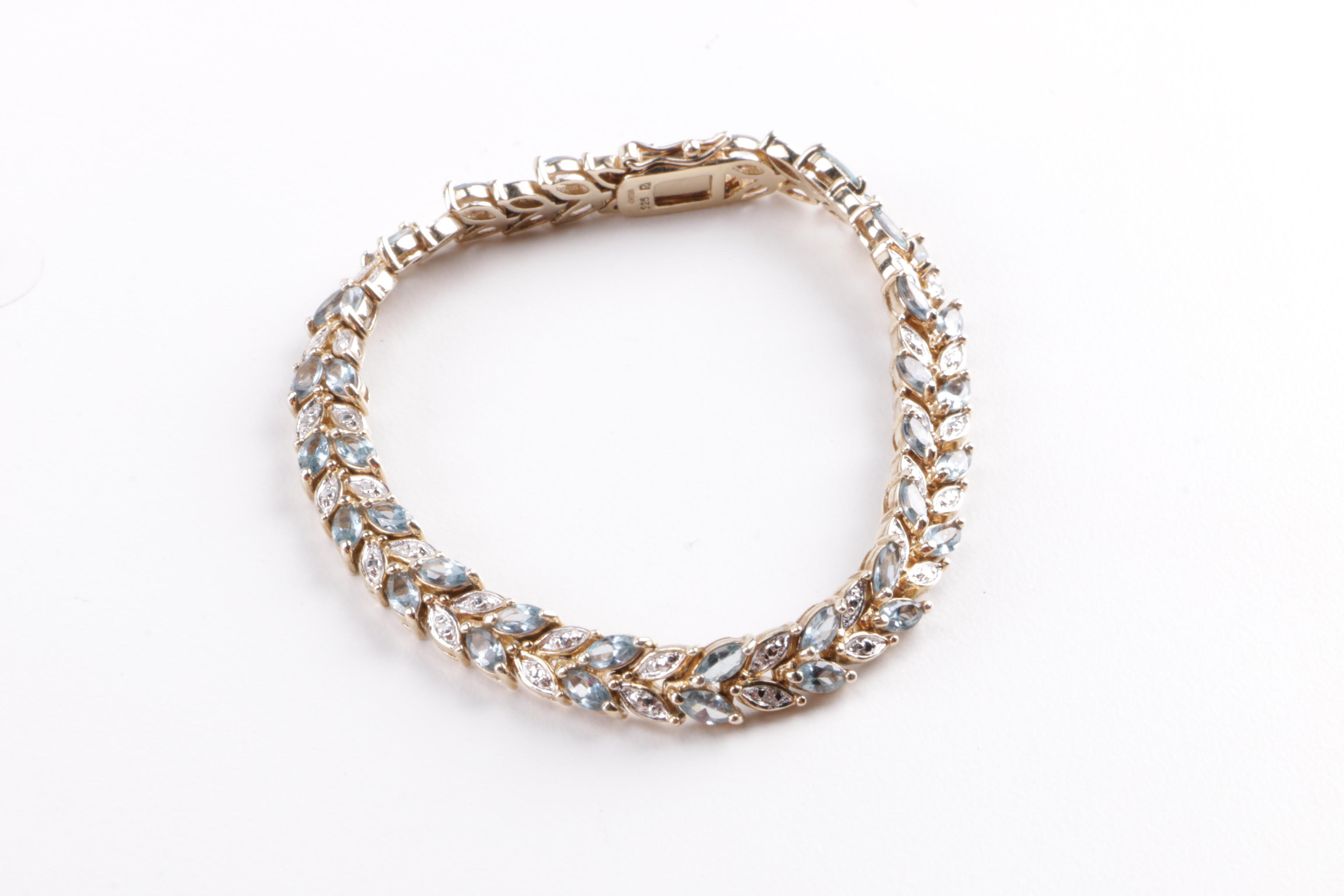 Sterling Silver and Diamond Jewelry Including Blue Topaz Demi Parure