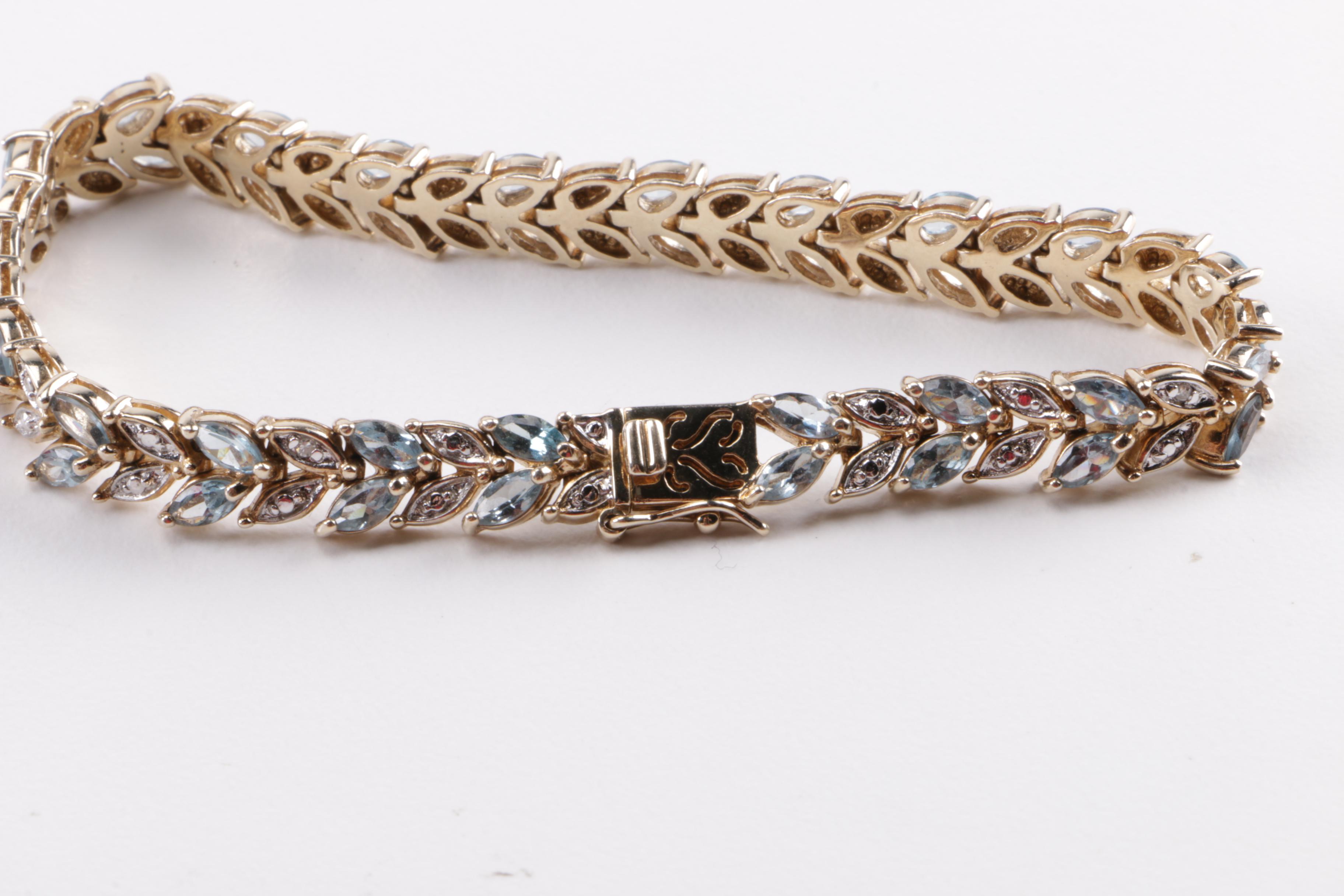 Sterling Silver and Diamond Jewelry Including Blue Topaz Demi Parure