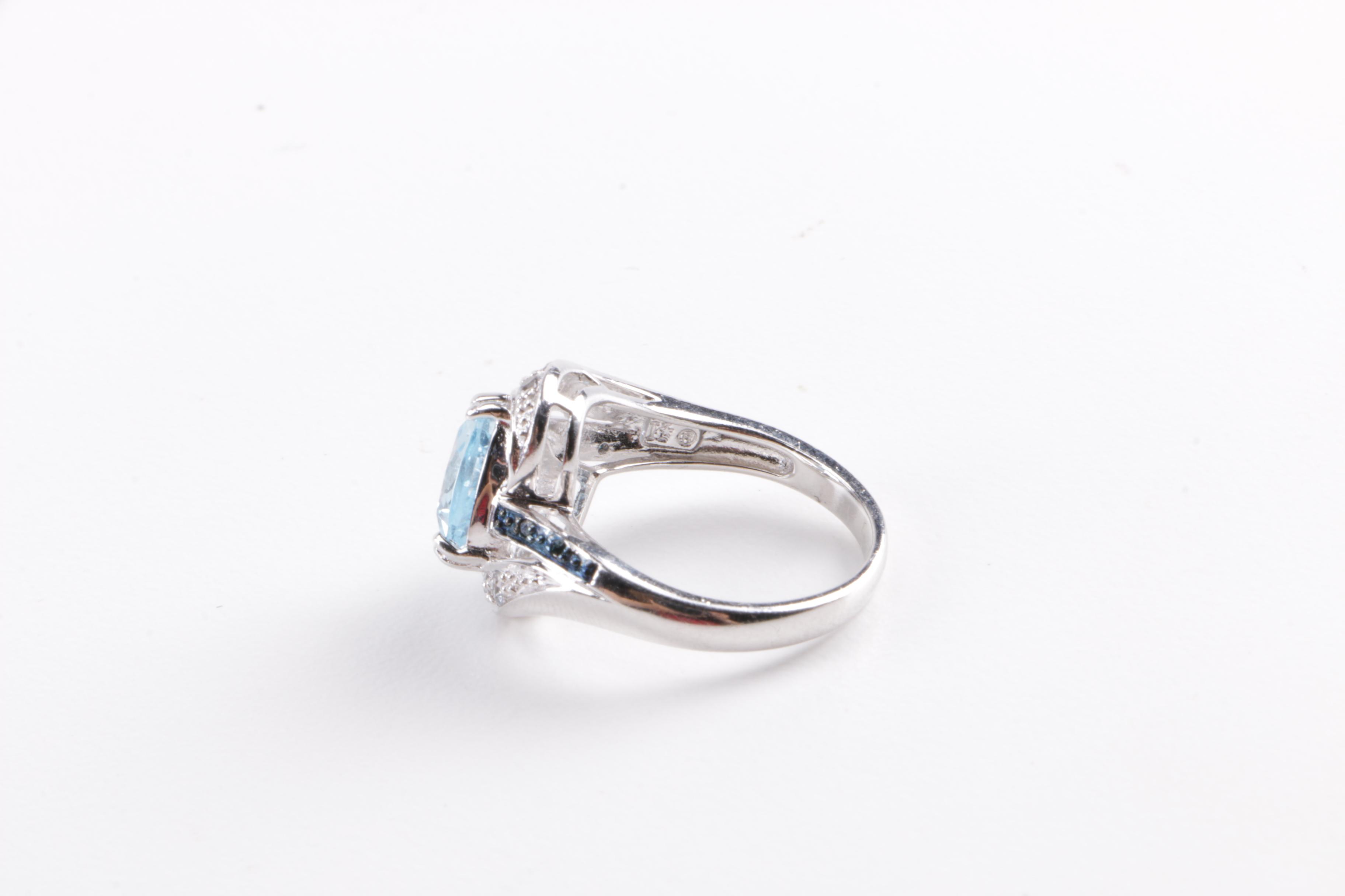 Sterling Silver and Diamond Jewelry Including Blue Topaz Demi Parure