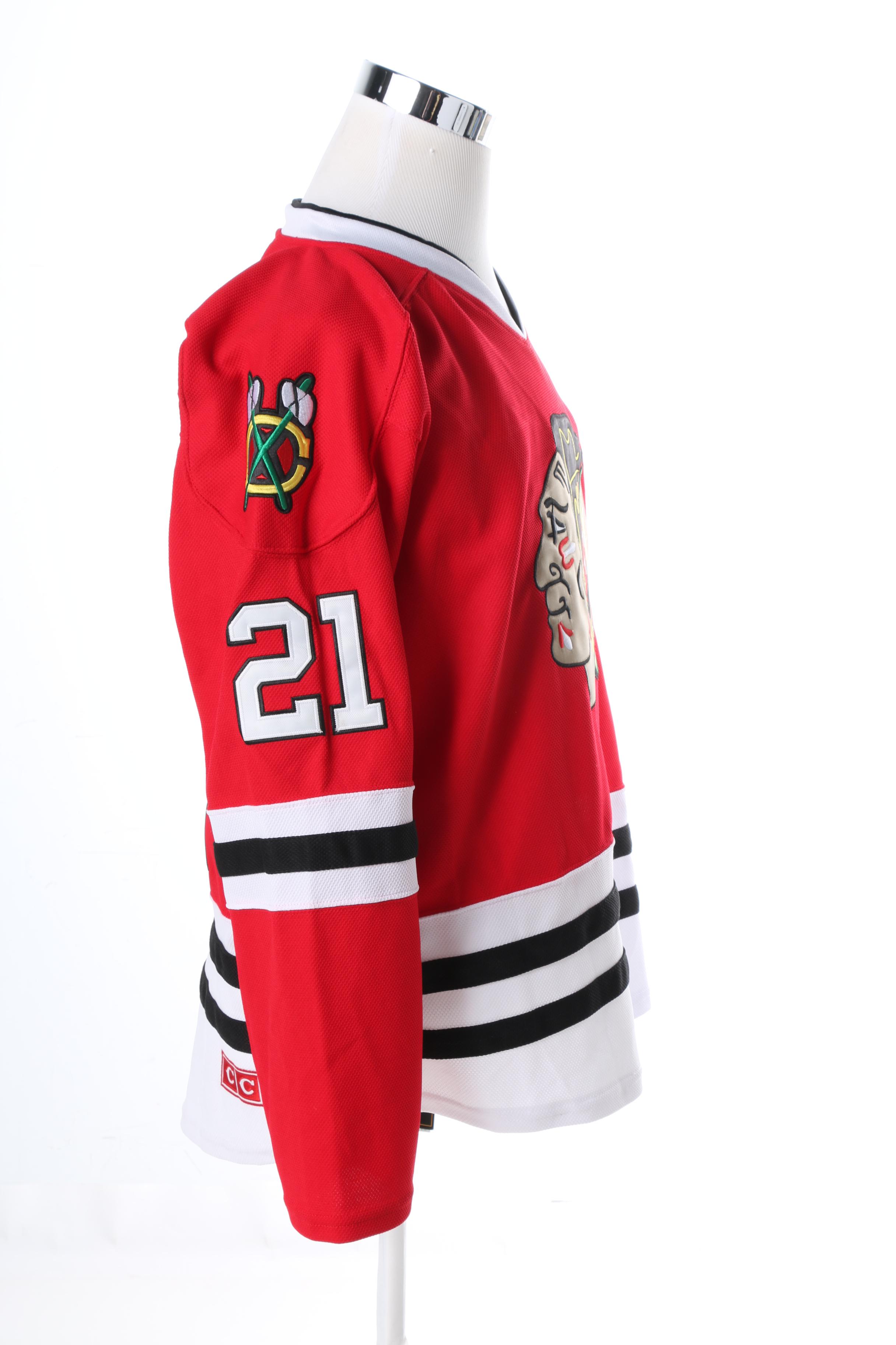 Stan Mikita Signed Jersey and Puck