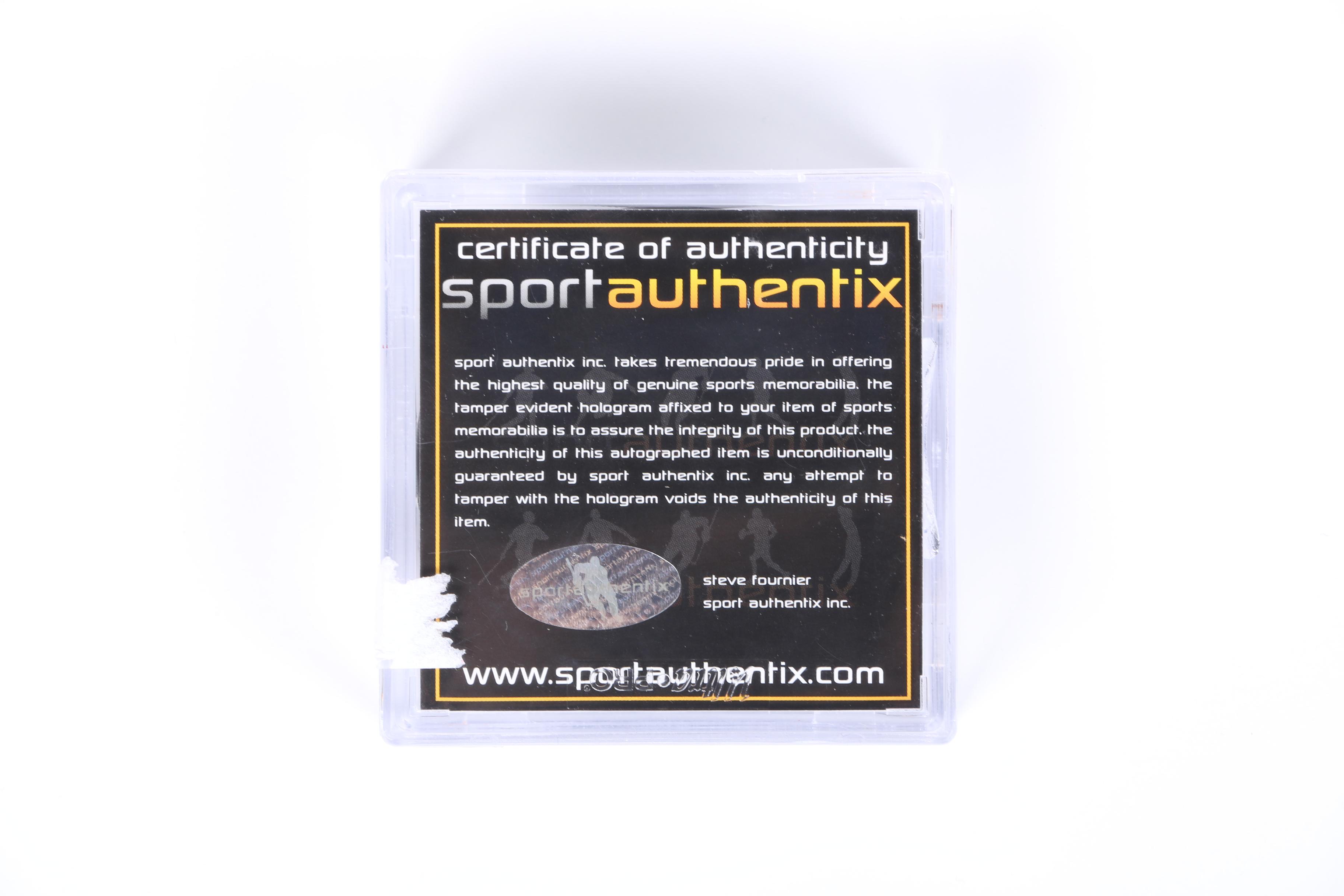 Stan Mikita Signed Jersey and Puck