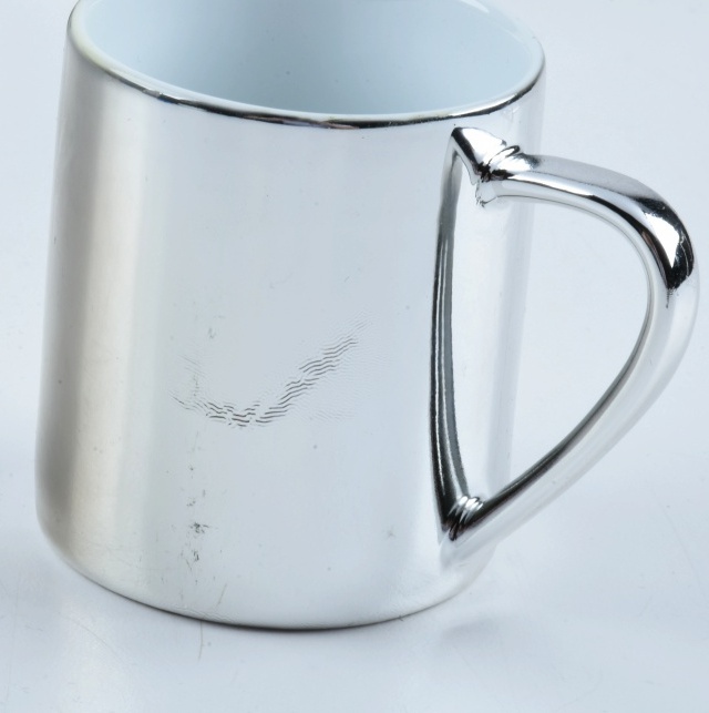 Four Damien Hirst "Virtue" Electroplated Cups and Saucers