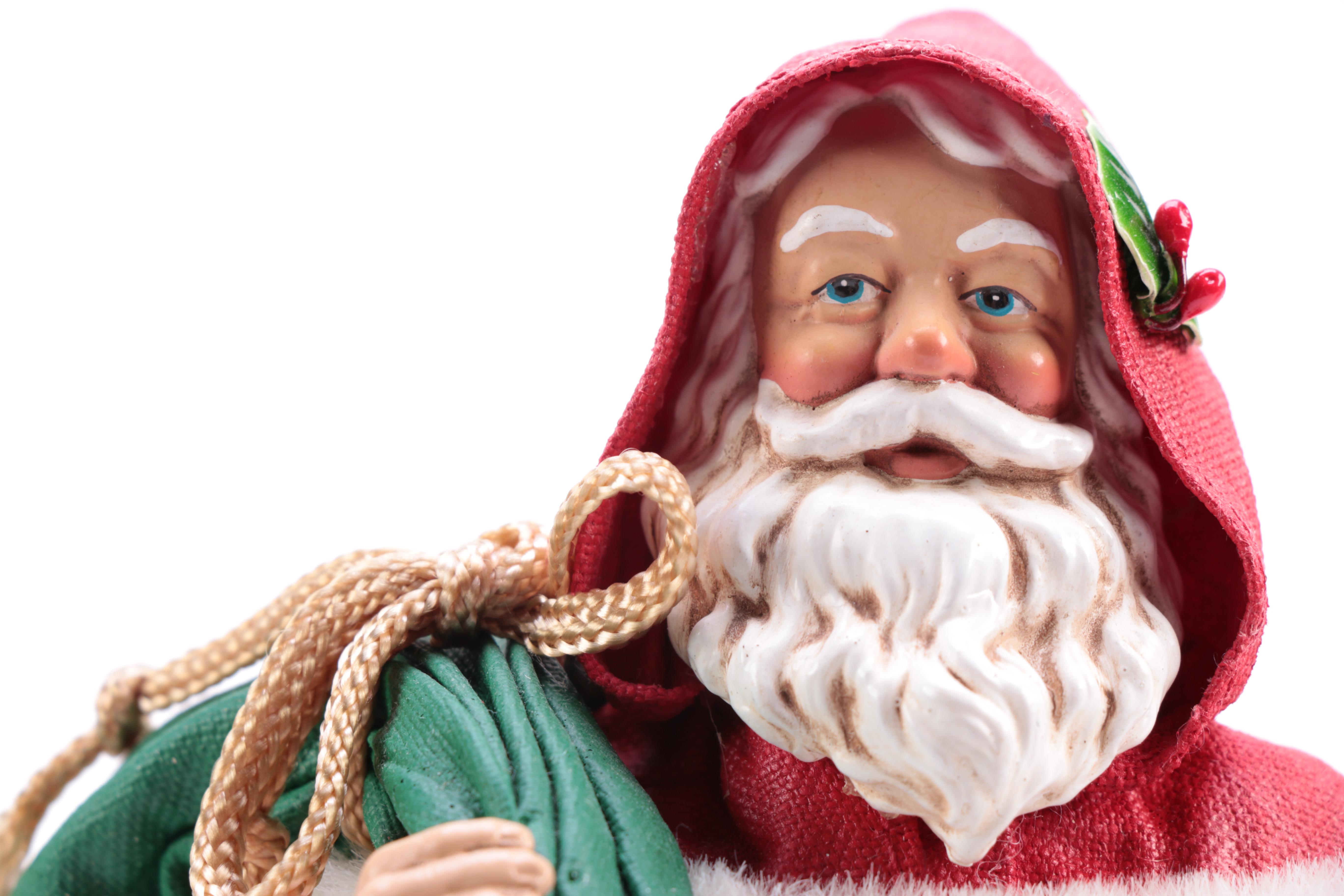 Assorted Santa Claus Figurines Including Clothtique Santas by Possible Dreams