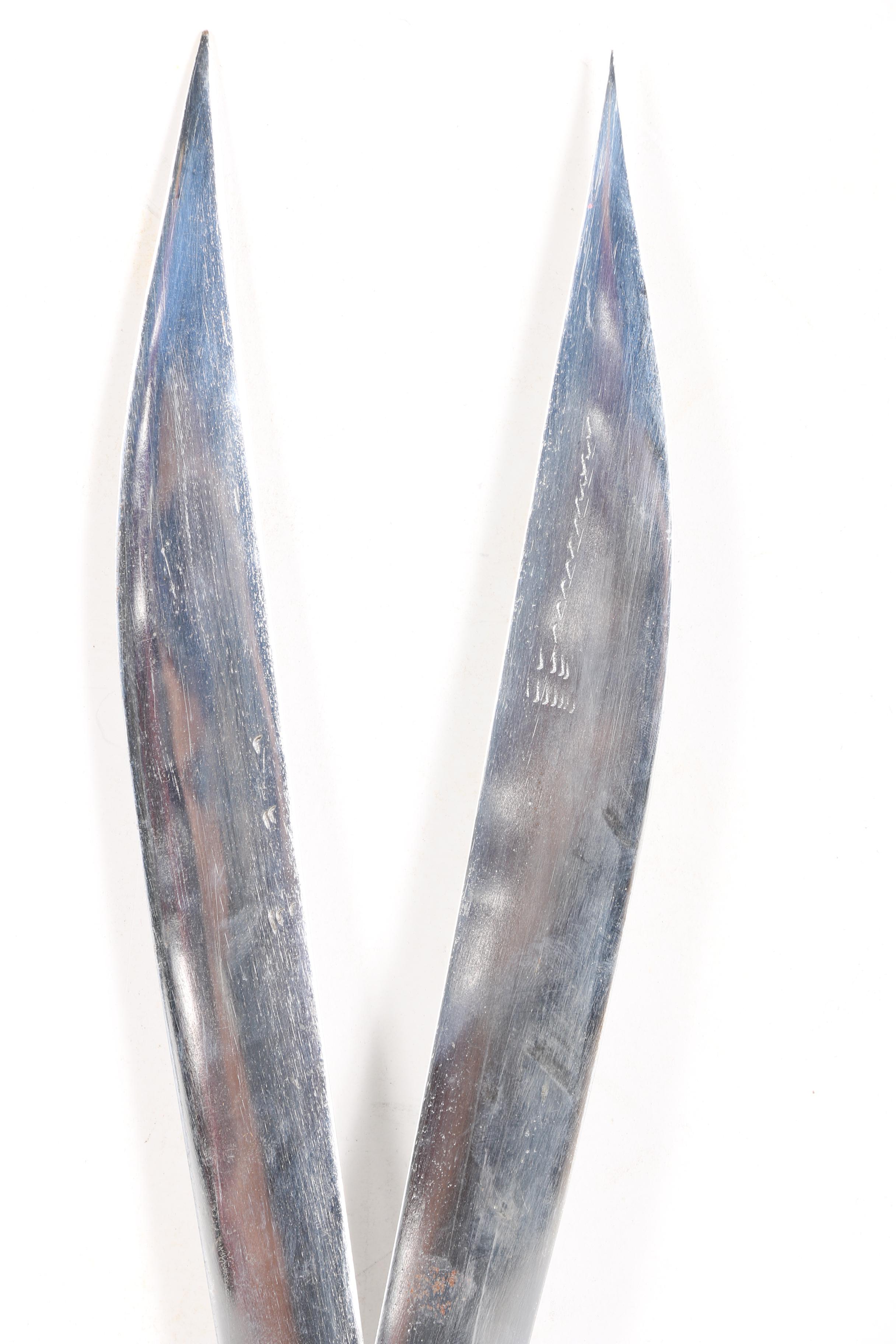 Sword Pair with Carved Handles and Scabbards