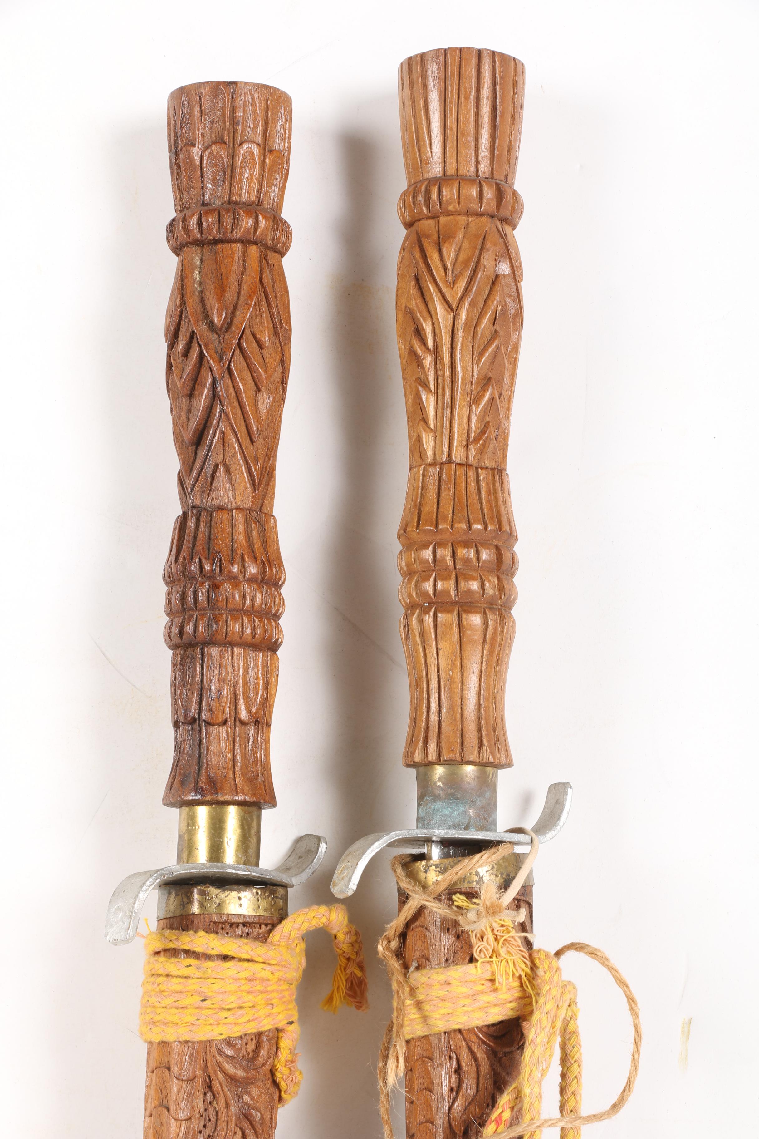 Sword Pair with Carved Handles and Scabbards