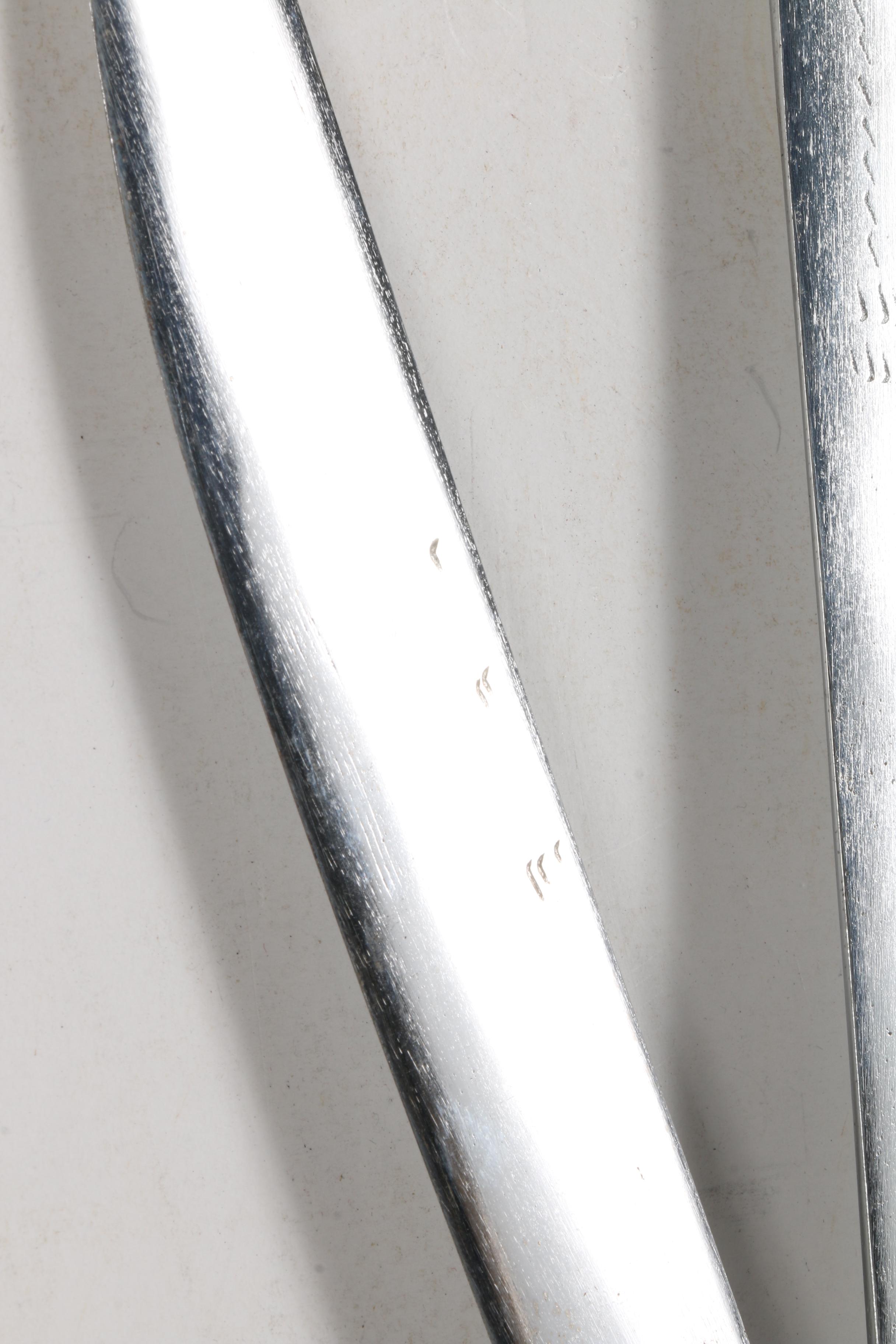 Sword Pair with Carved Handles and Scabbards