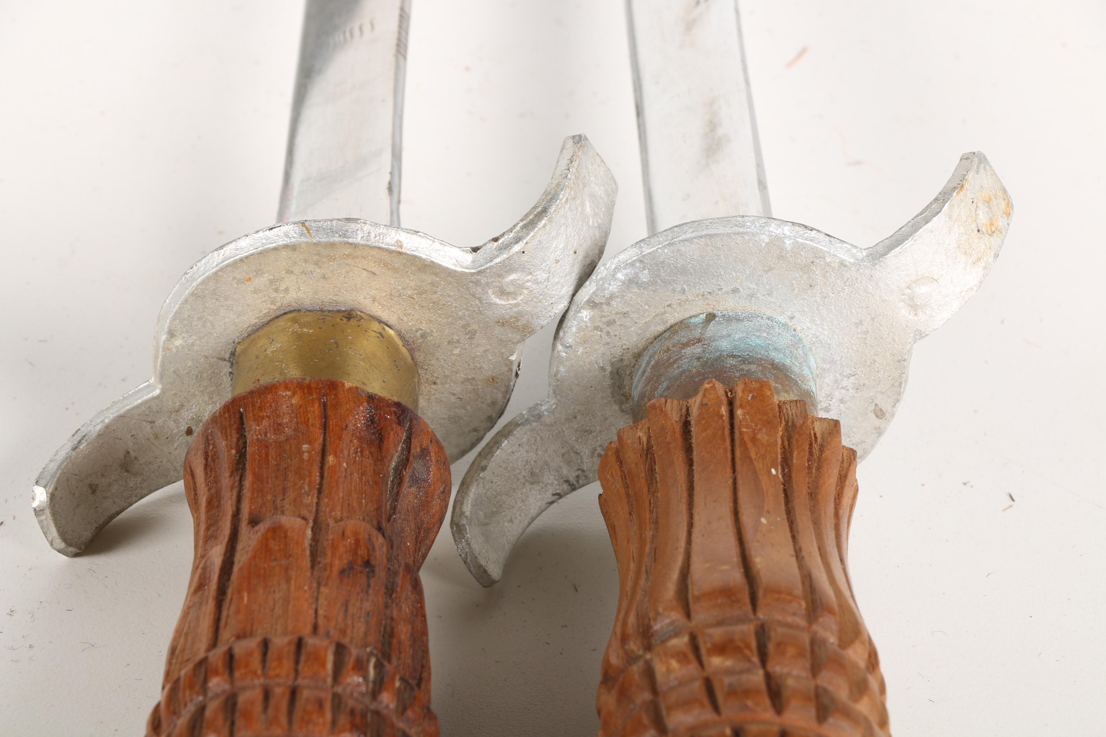 Sword Pair with Carved Handles and Scabbards