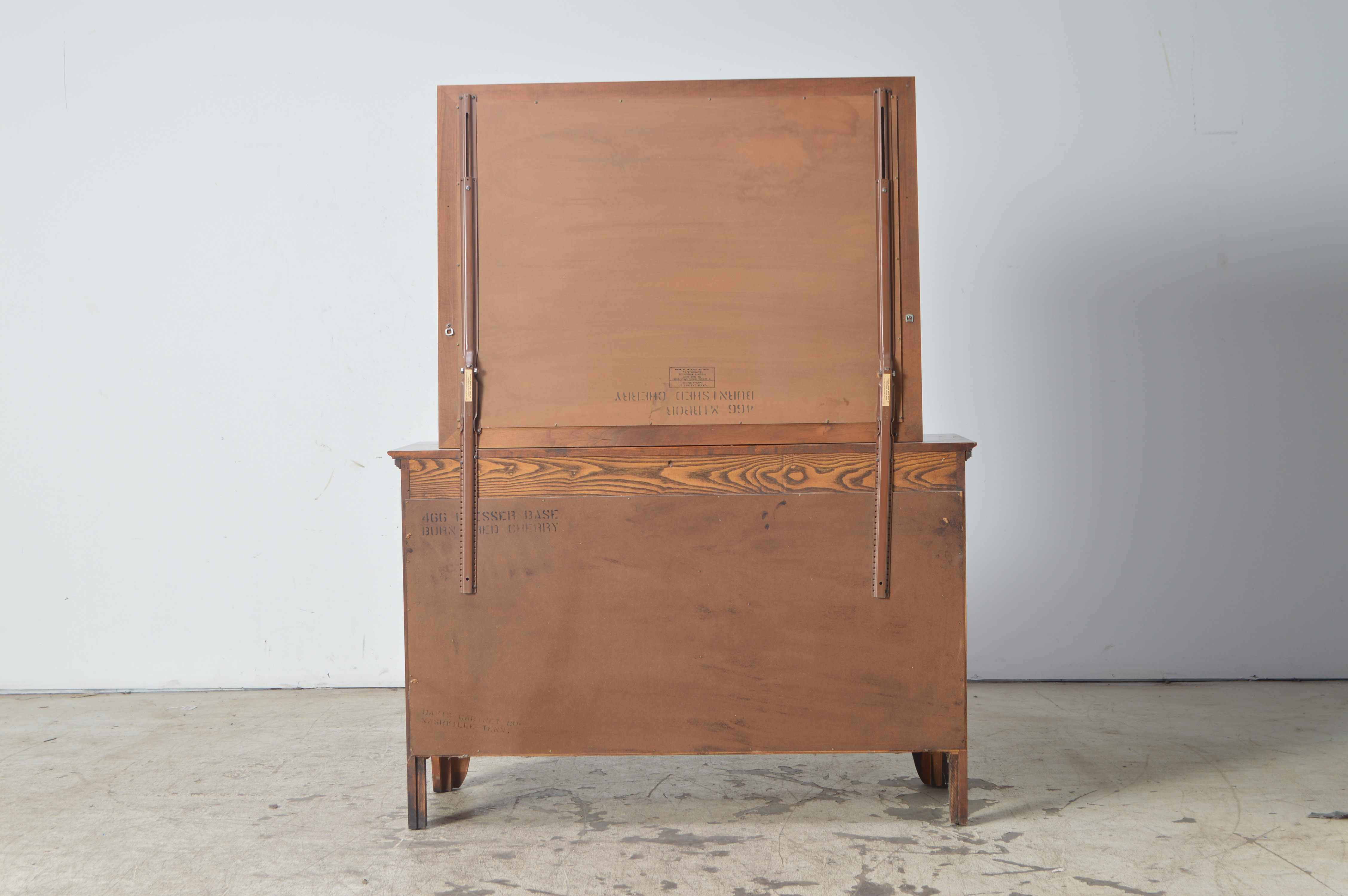 Solid Burnished Cherry Dresser and Mirror by Davis Cabinet Company of Tennessee Dated July, 1963