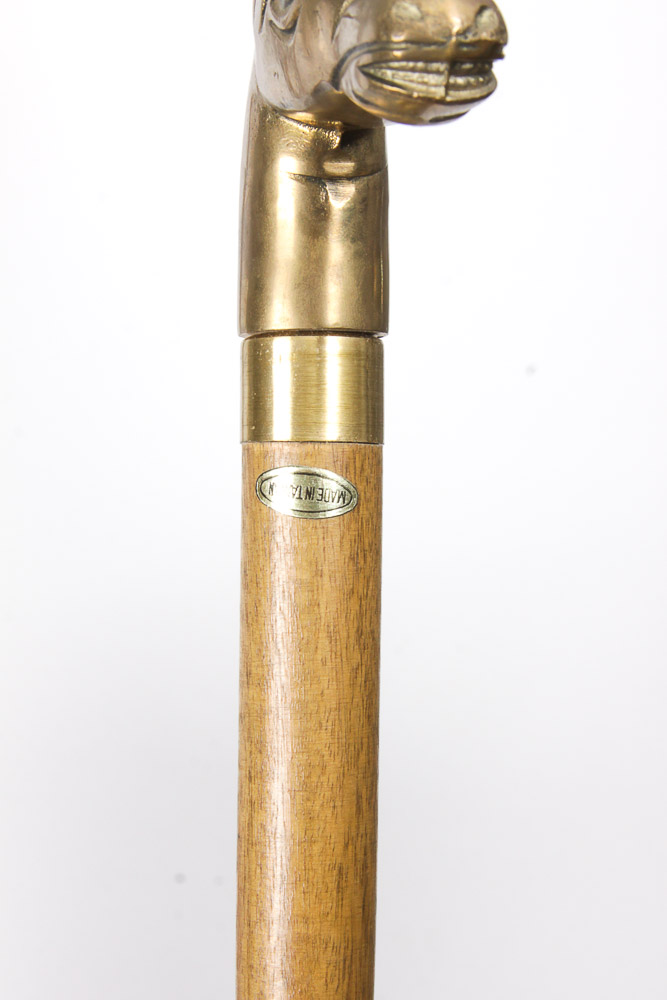 Animal Head Canes in an Umbrella Stand