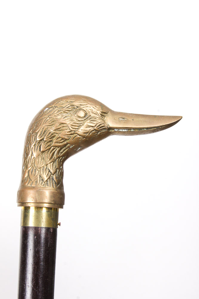 Animal Head Canes in an Umbrella Stand