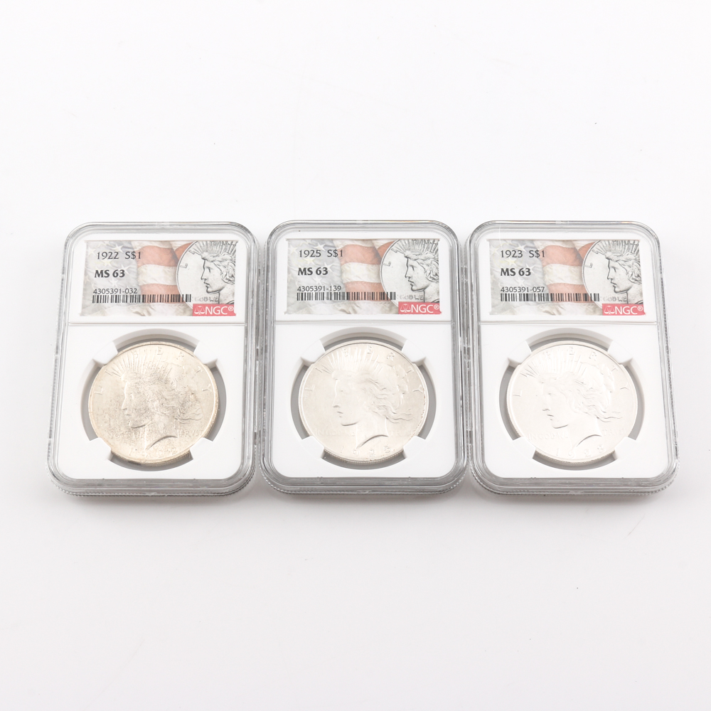 1922, 1923, and 1925 Peace Dollar Encapsulated and Graded MS 63 by NGC