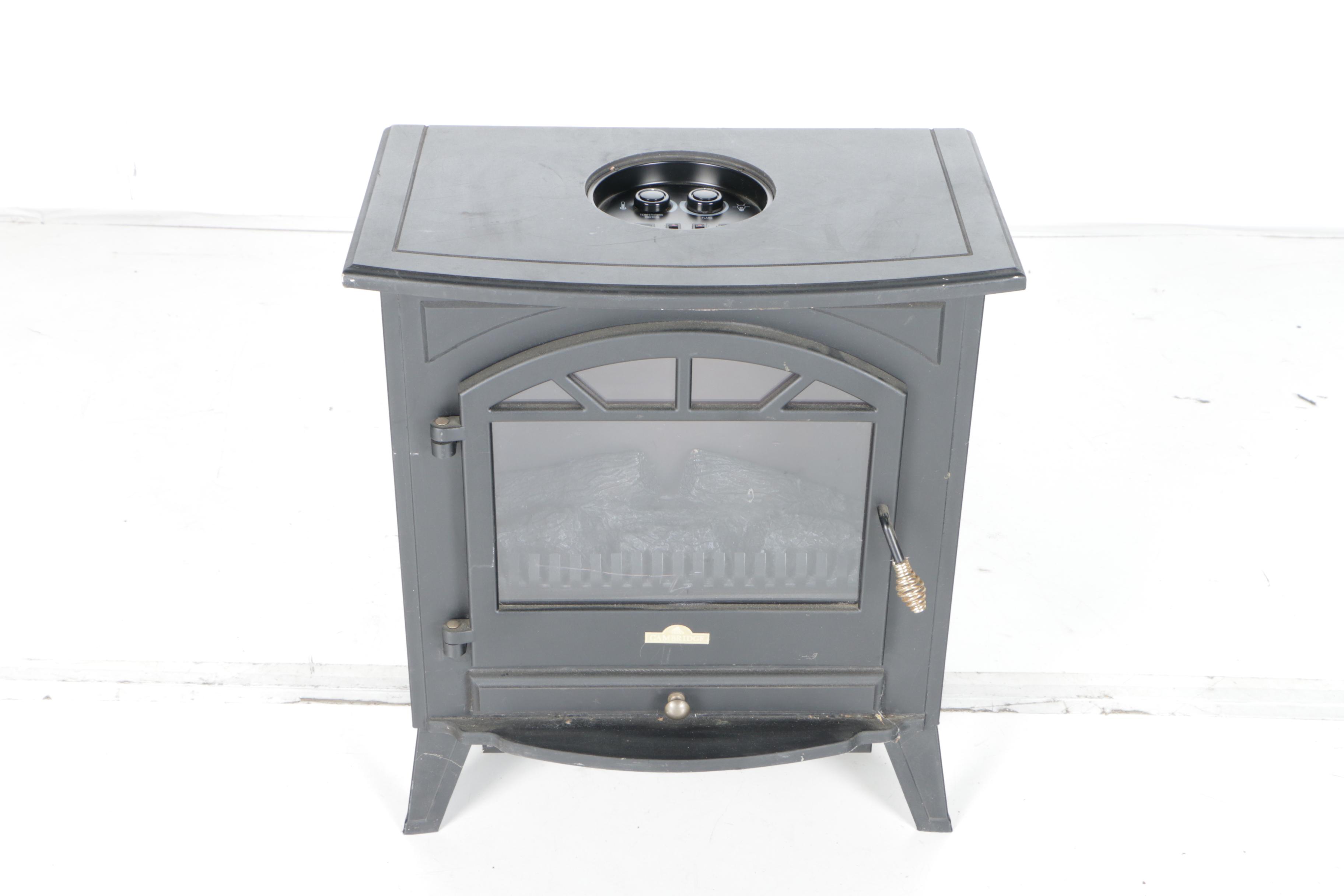 Black Wood Stove and Andirons