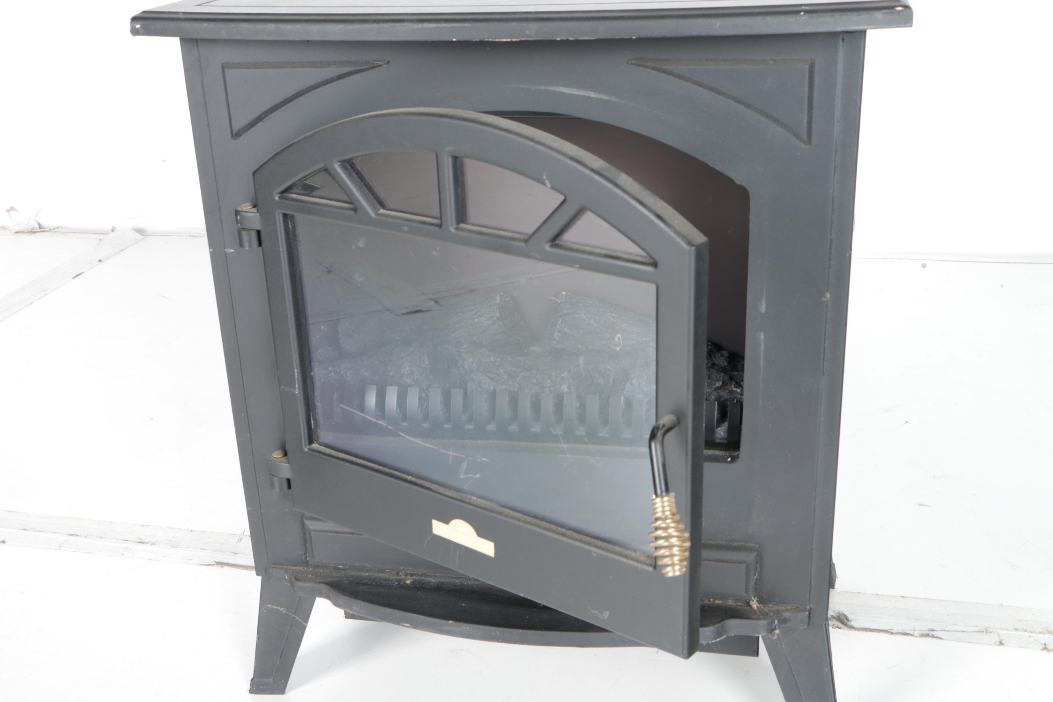 Black Wood Stove and Andirons