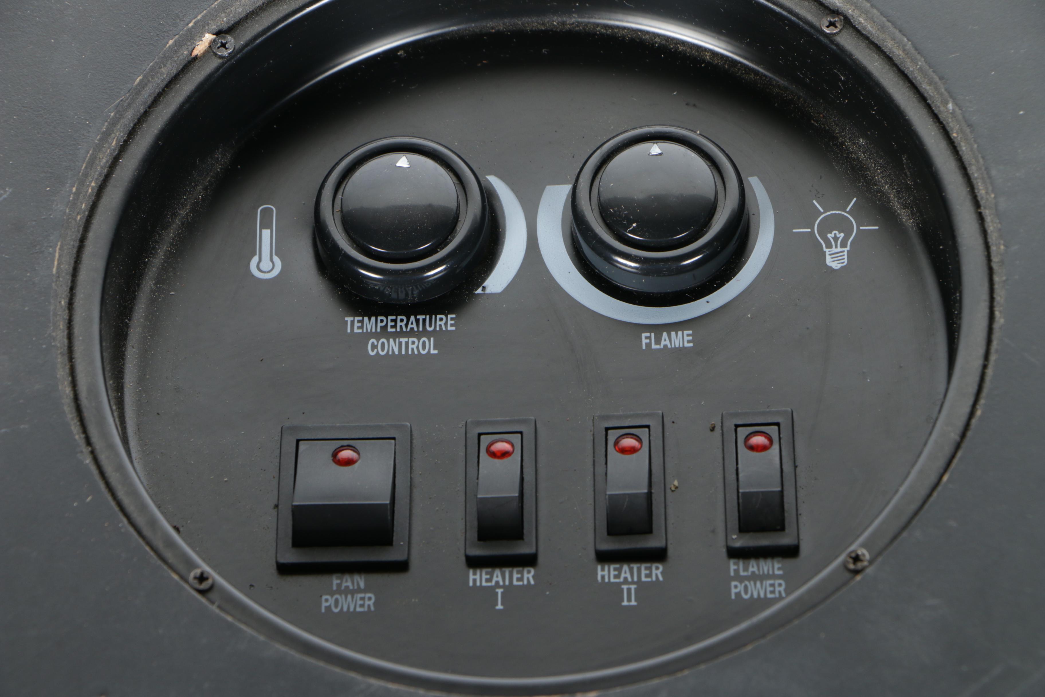 Black Wood Stove and Andirons