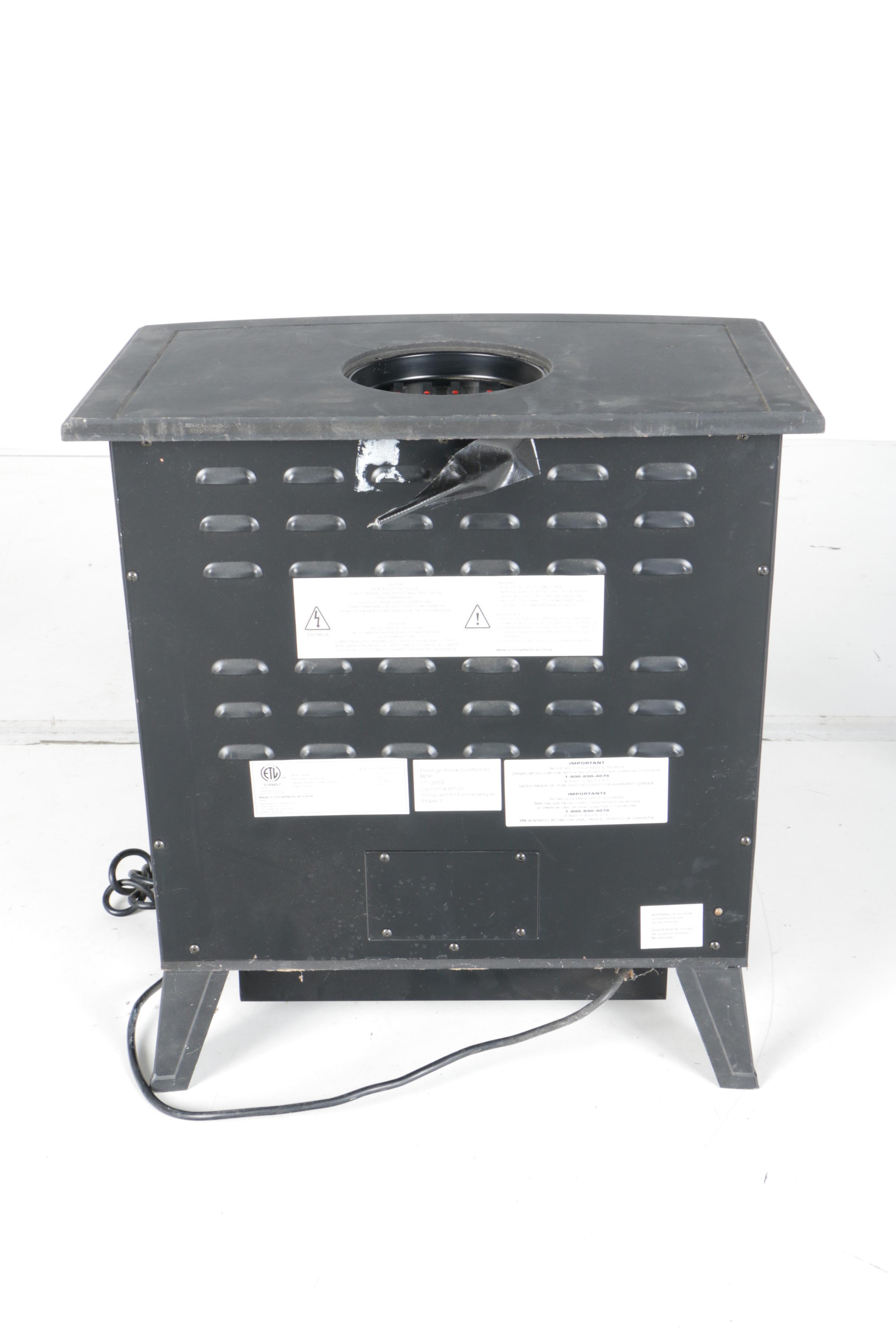 Black Wood Stove and Andirons