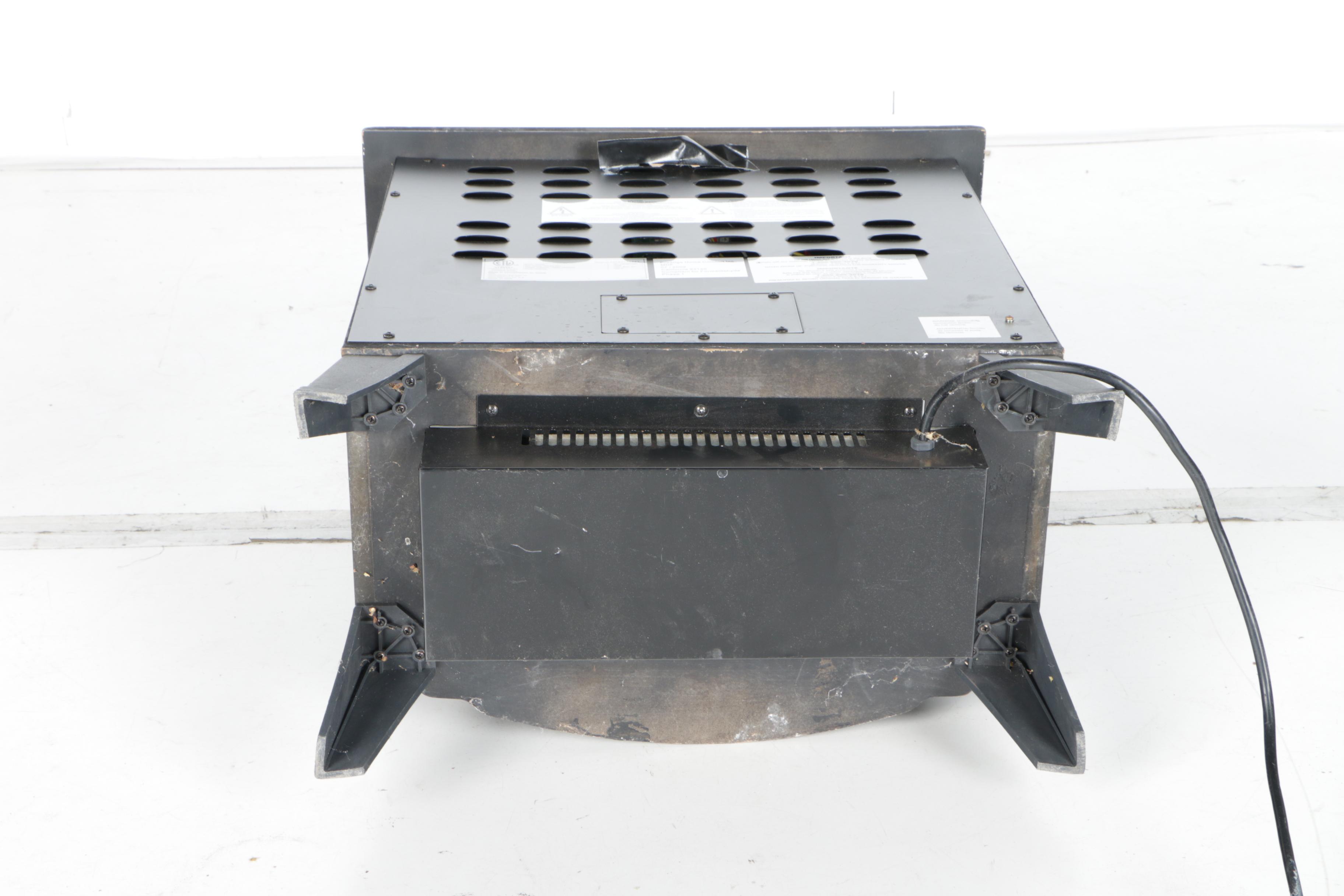 Black Wood Stove and Andirons