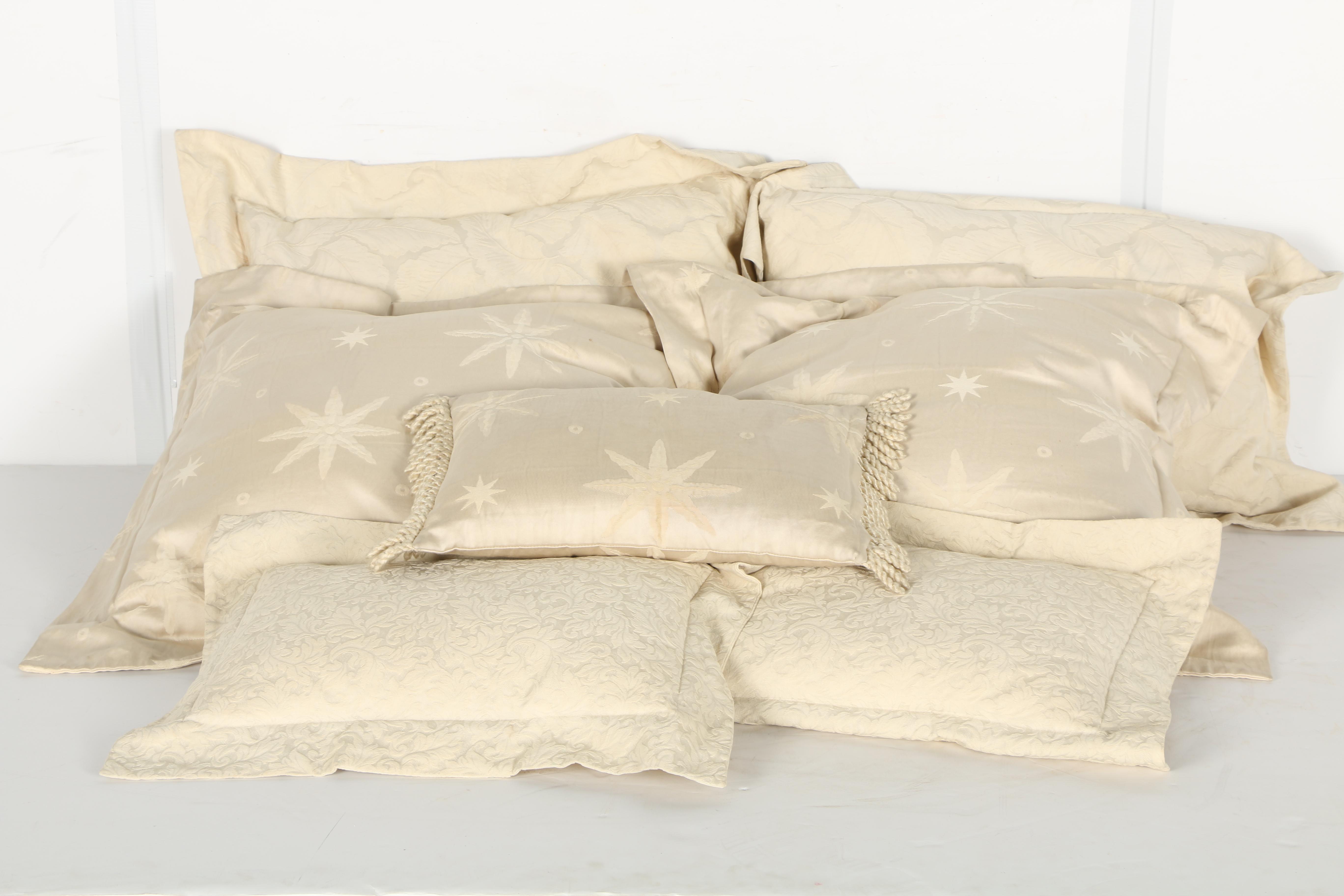 Cream Pillows With Star and Leaf Motifs