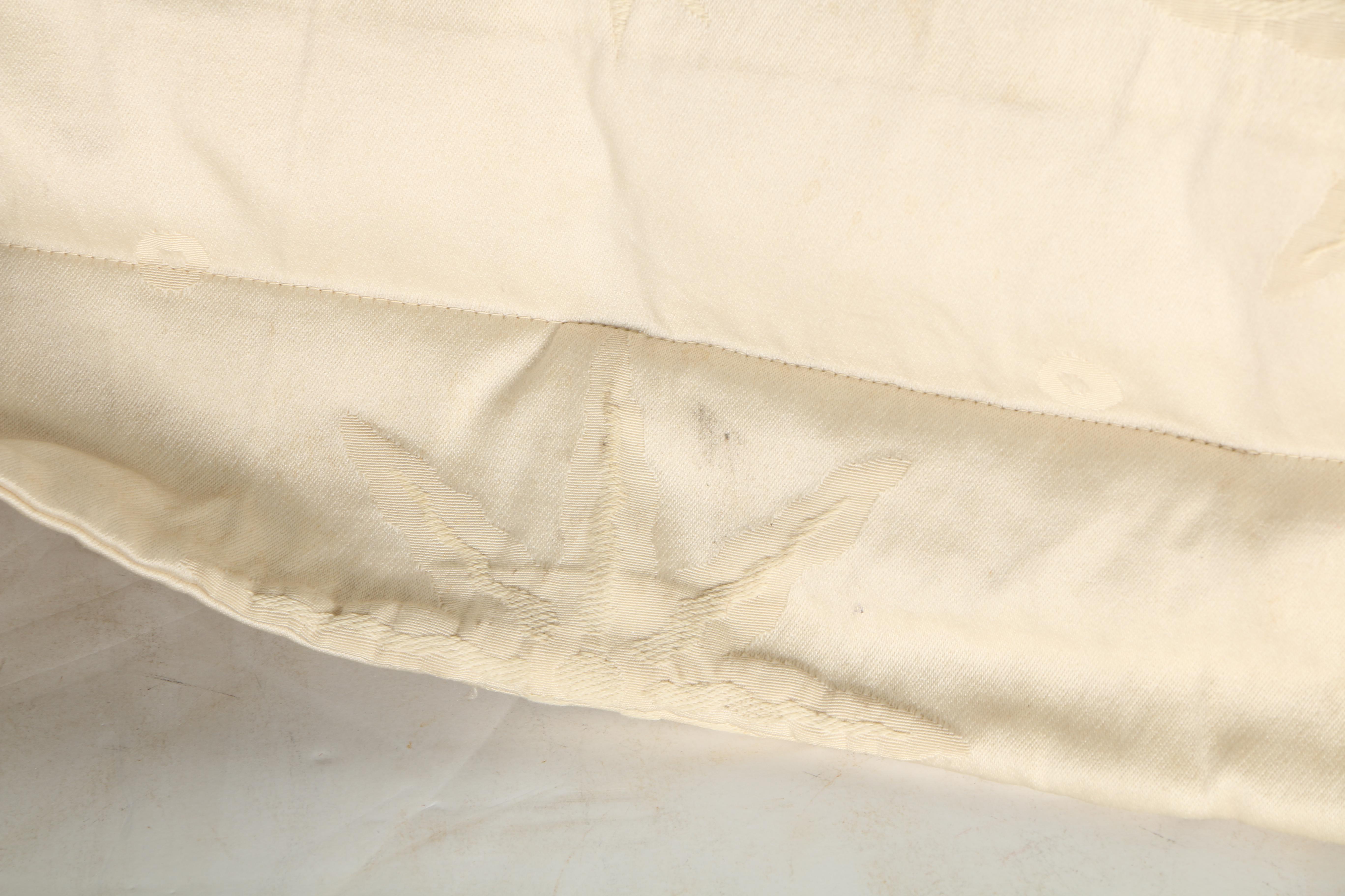 Cream Pillows With Star and Leaf Motifs