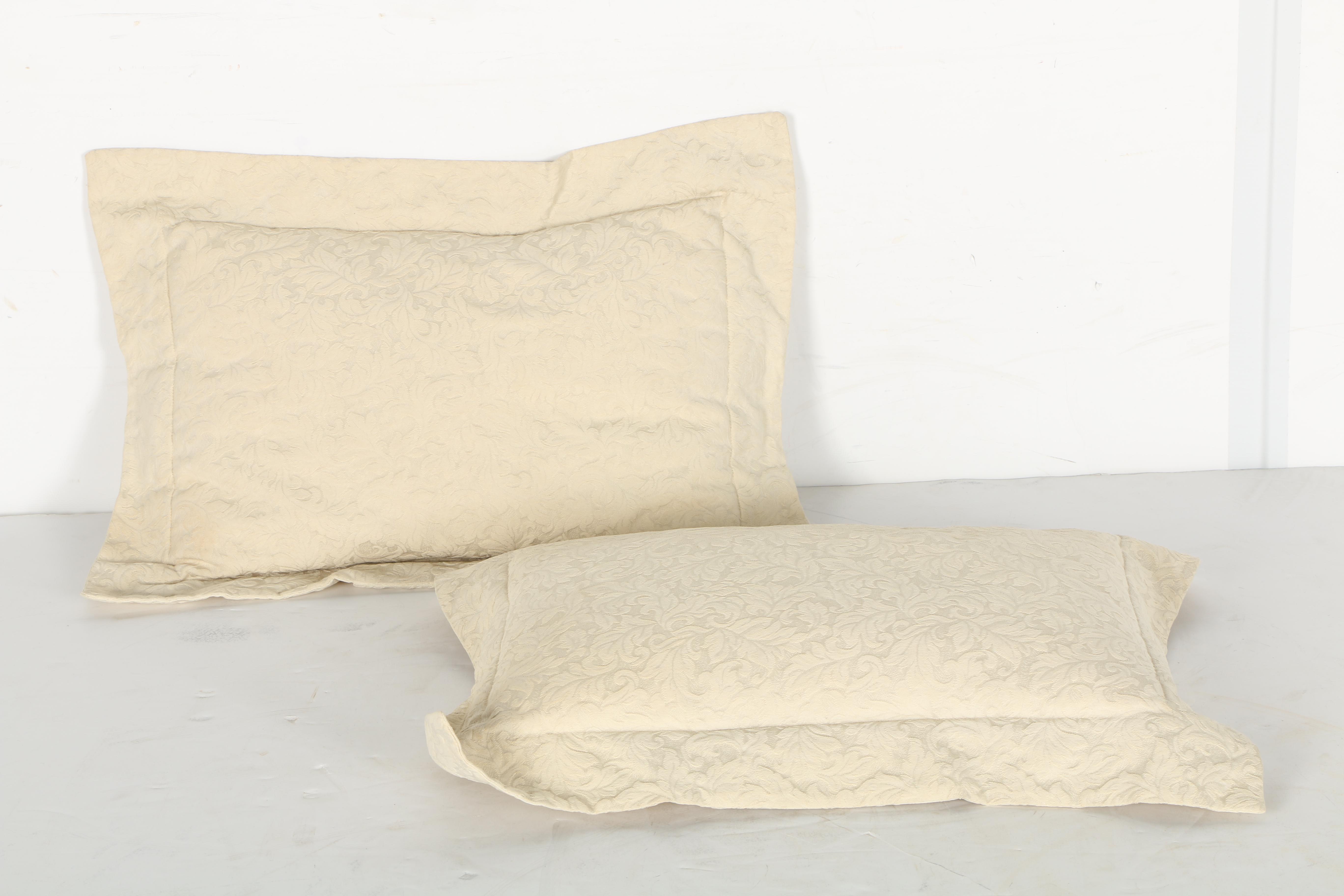 Cream Pillows With Star and Leaf Motifs