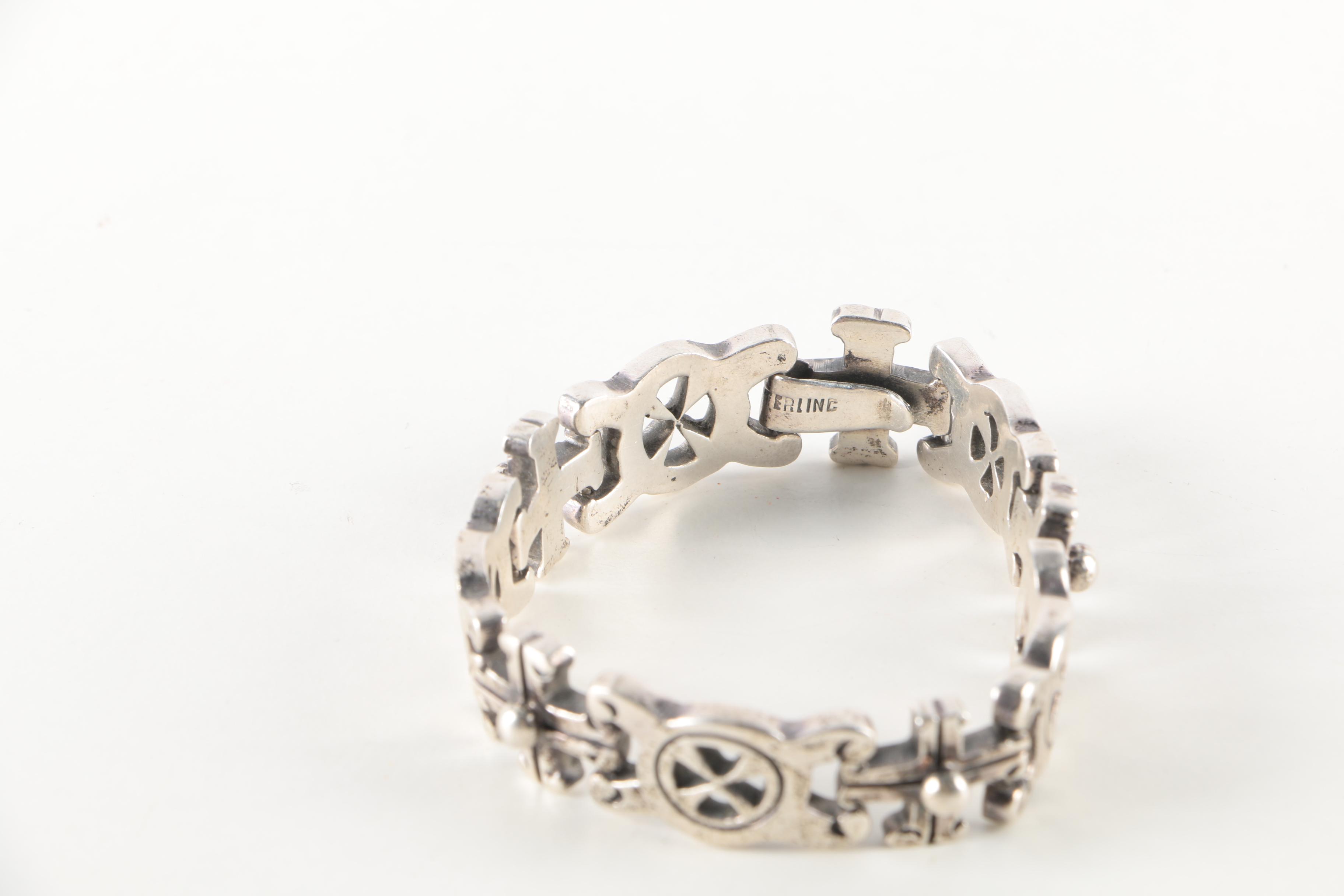 Sterling Silver Bracelets and Earrings Featuring Onyx and Shell