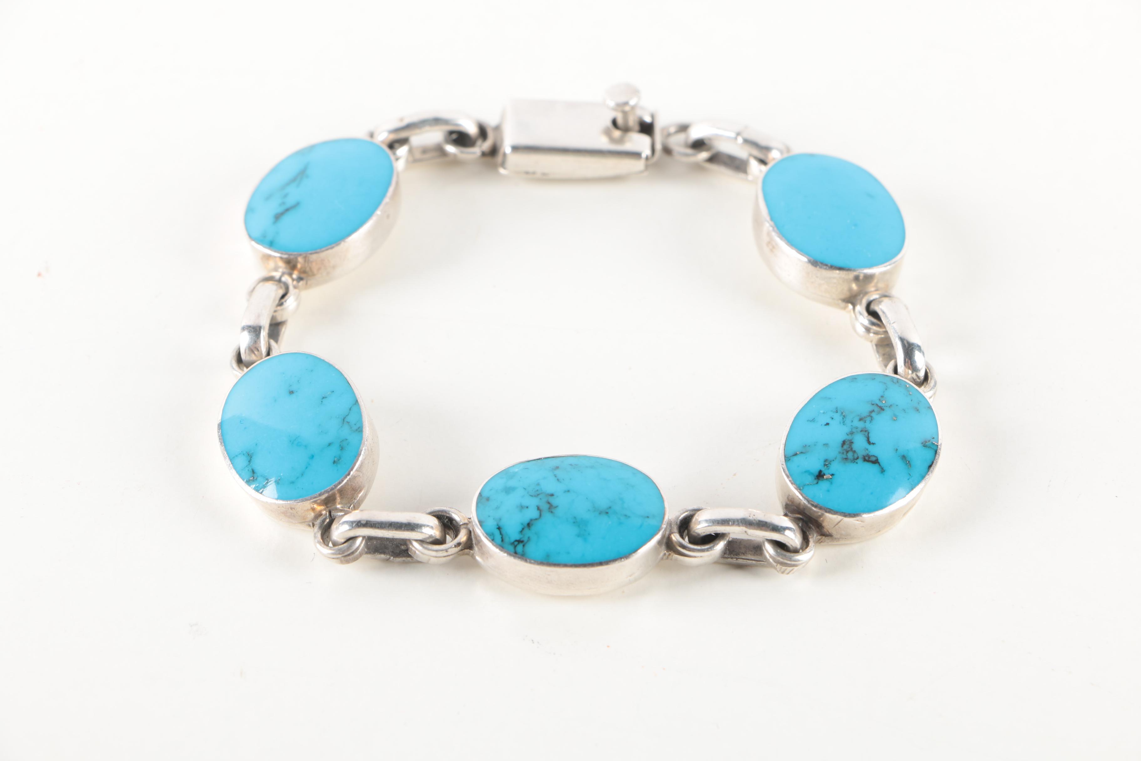 Sterling Silver Bracelets and Earrings Featuring Onyx and Shell