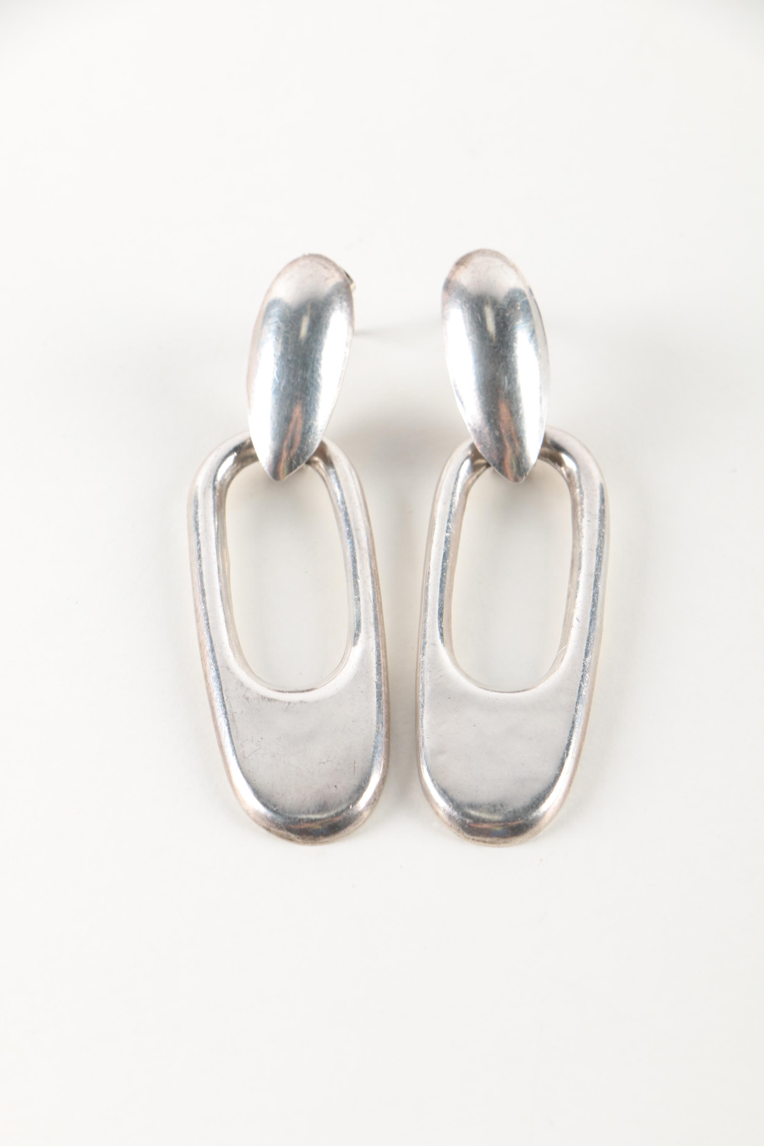 Sterling Silver Bracelets and Earrings Featuring Onyx and Shell