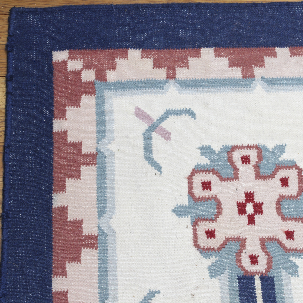 Handwoven Floral Area Rug