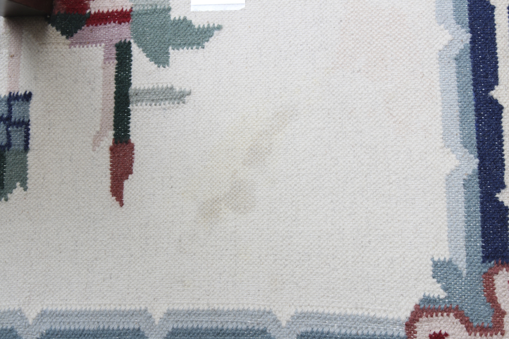 Handwoven Floral Area Rug