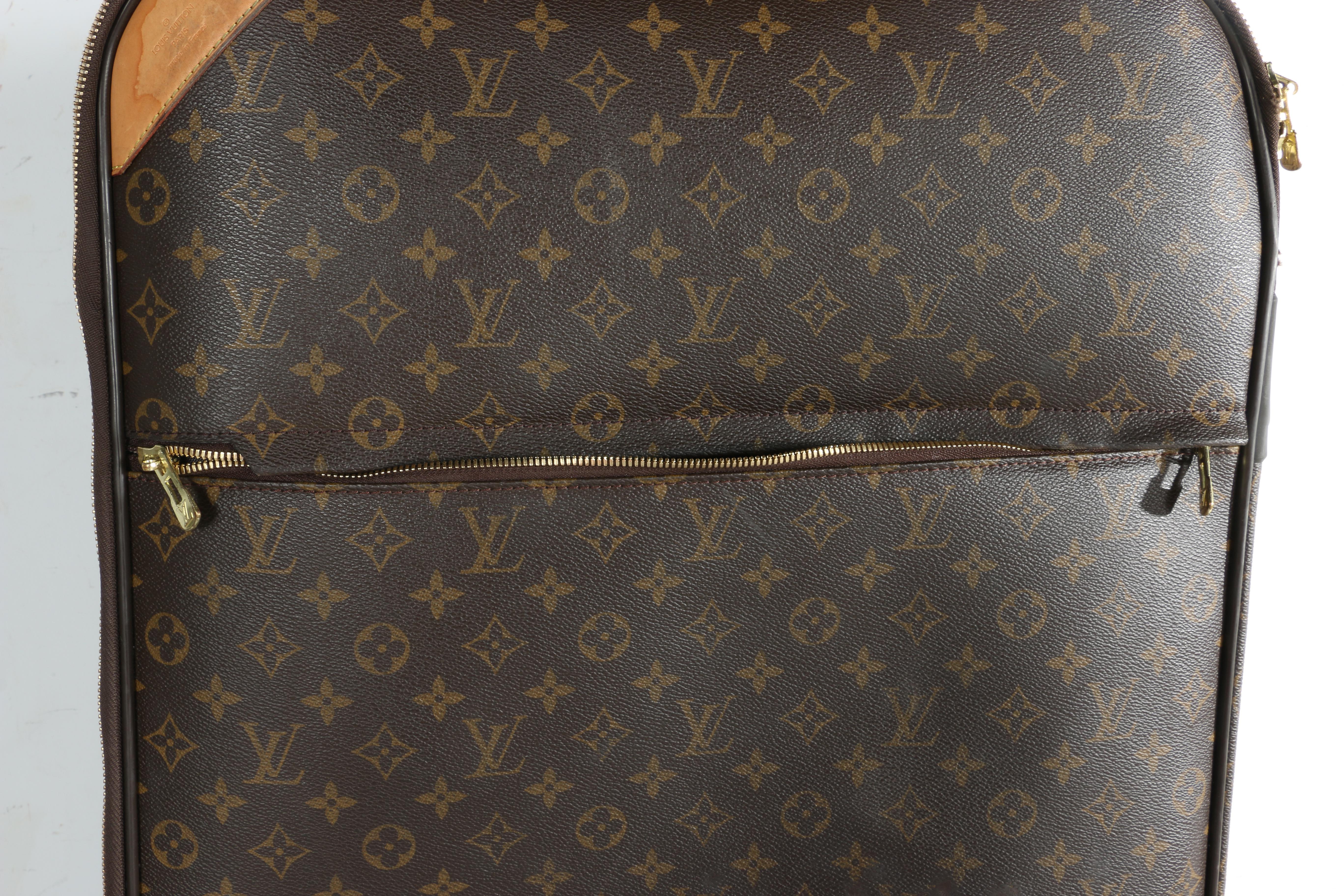 Louis Vuitton Monogram Rolling Suitcase