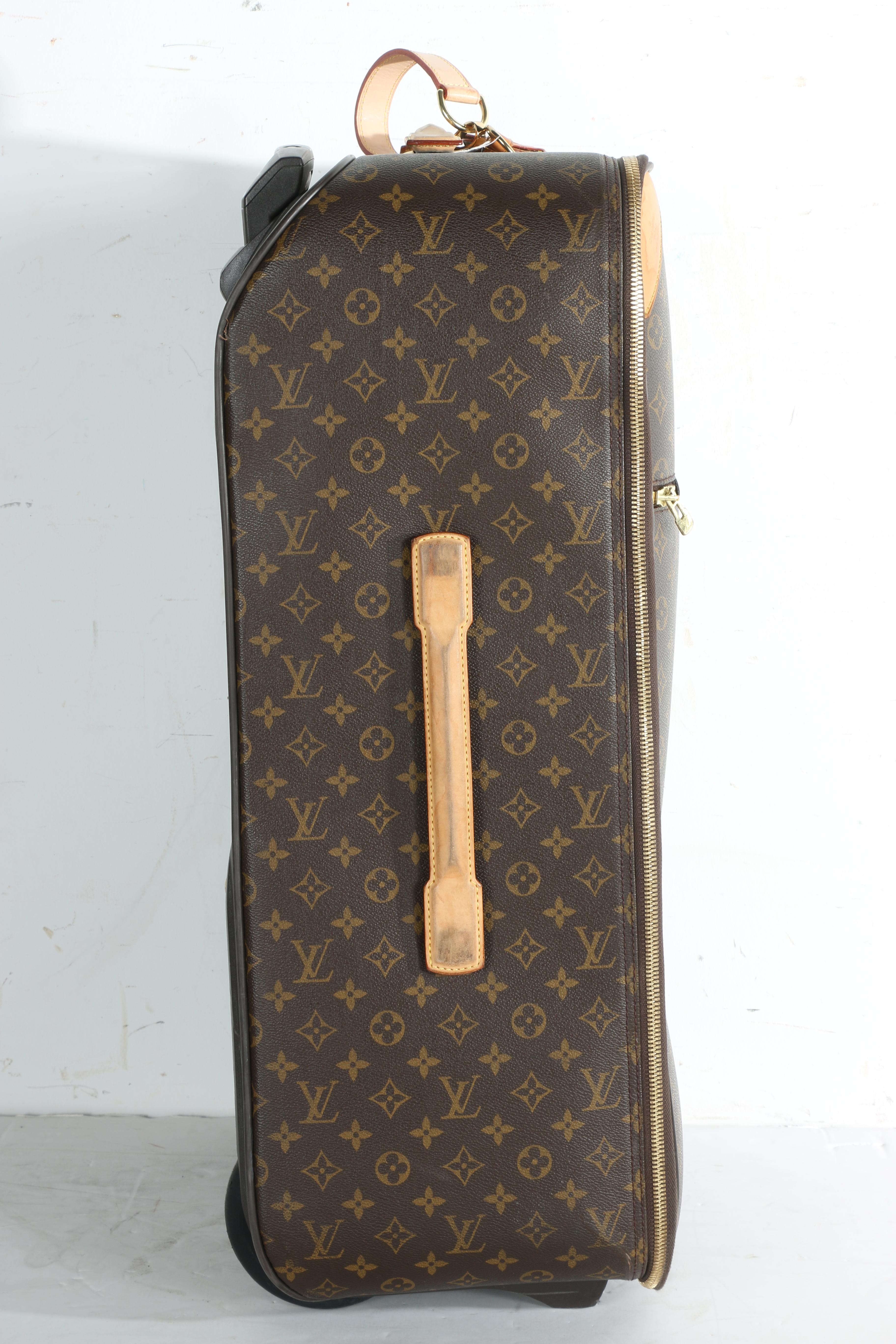 Louis Vuitton Monogram Rolling Suitcase