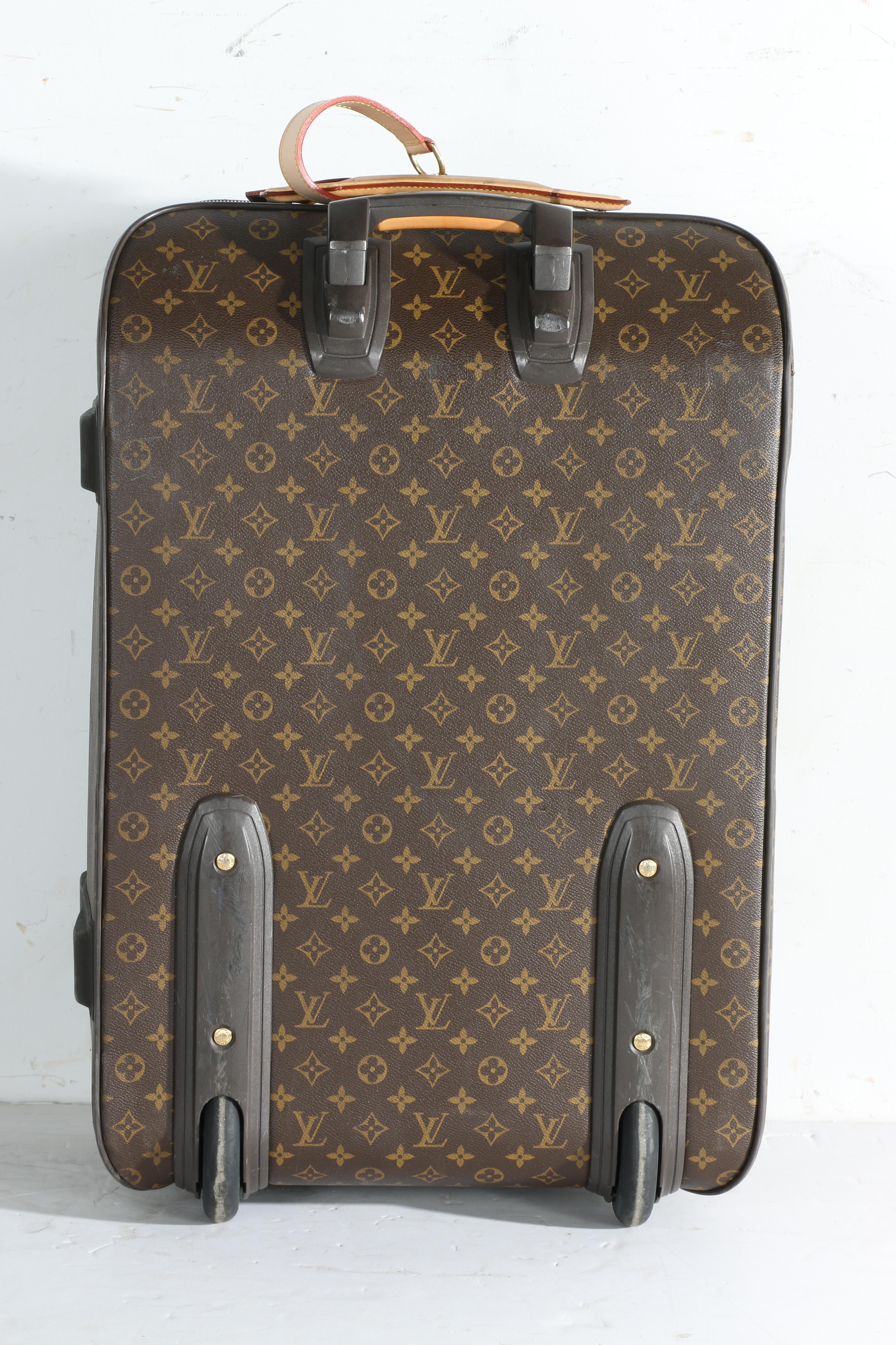 Louis Vuitton Monogram Rolling Suitcase