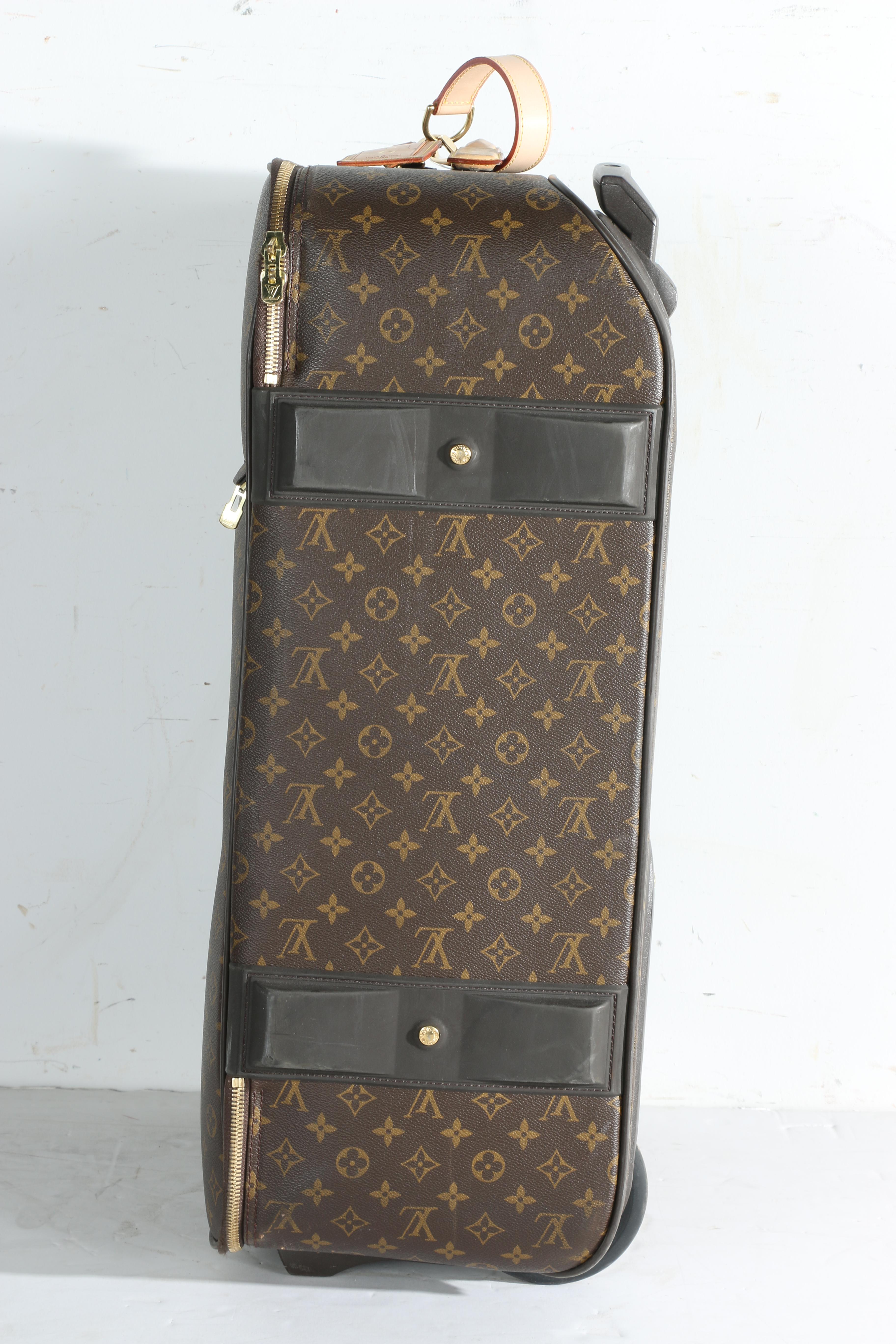 Louis Vuitton Monogram Rolling Suitcase