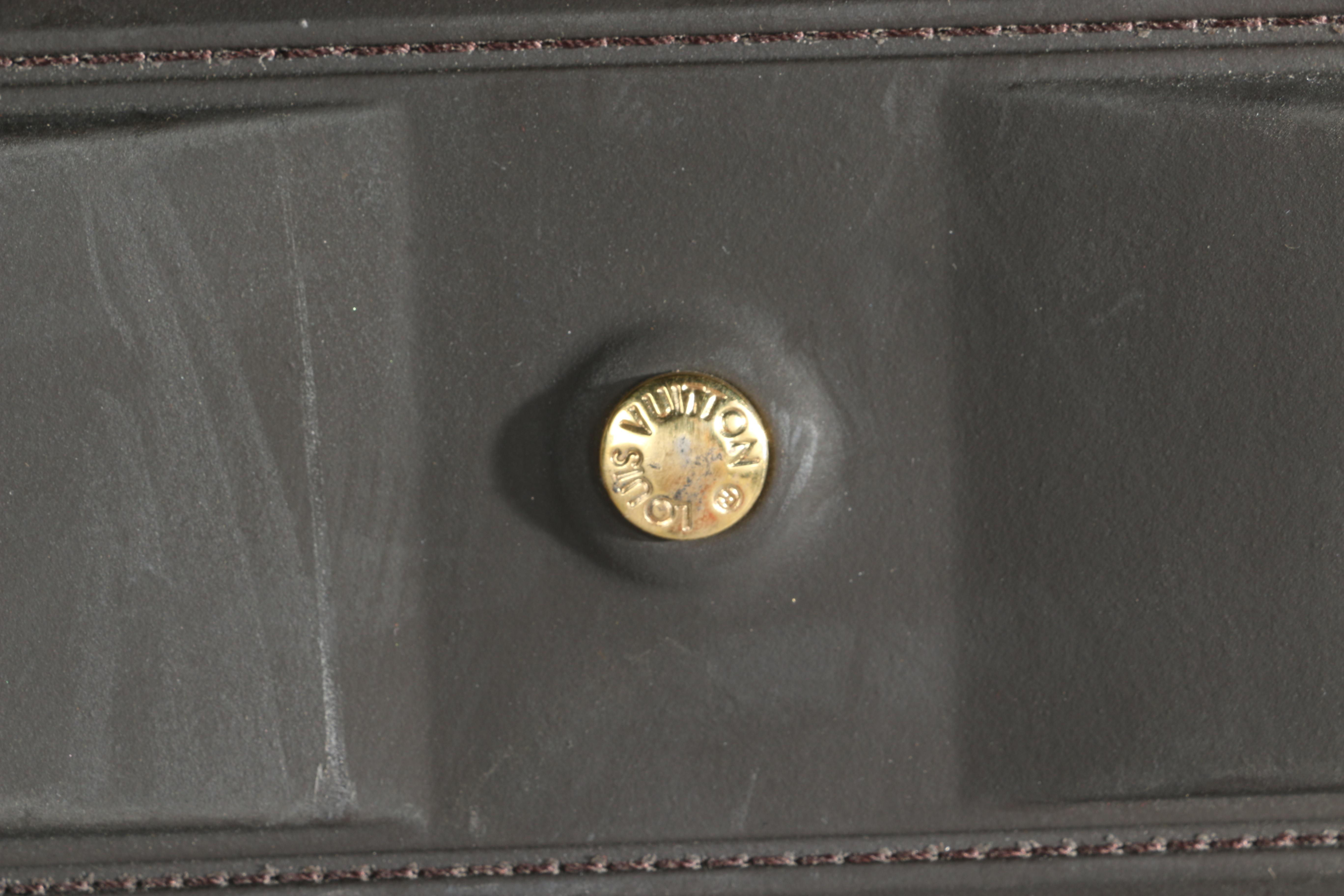 Louis Vuitton Monogram Rolling Suitcase